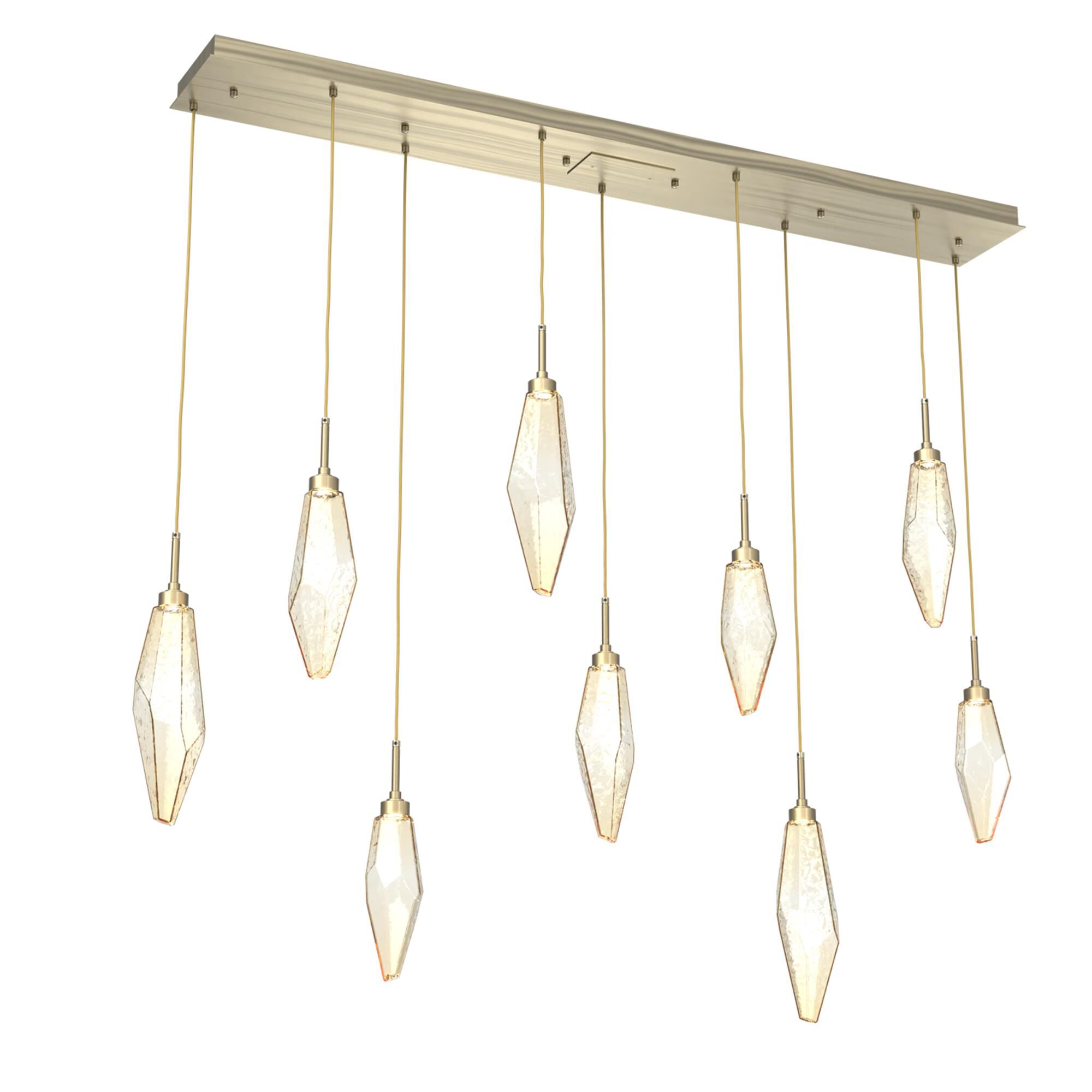 Shown in Novel Brass finish and Chilled Amber glass