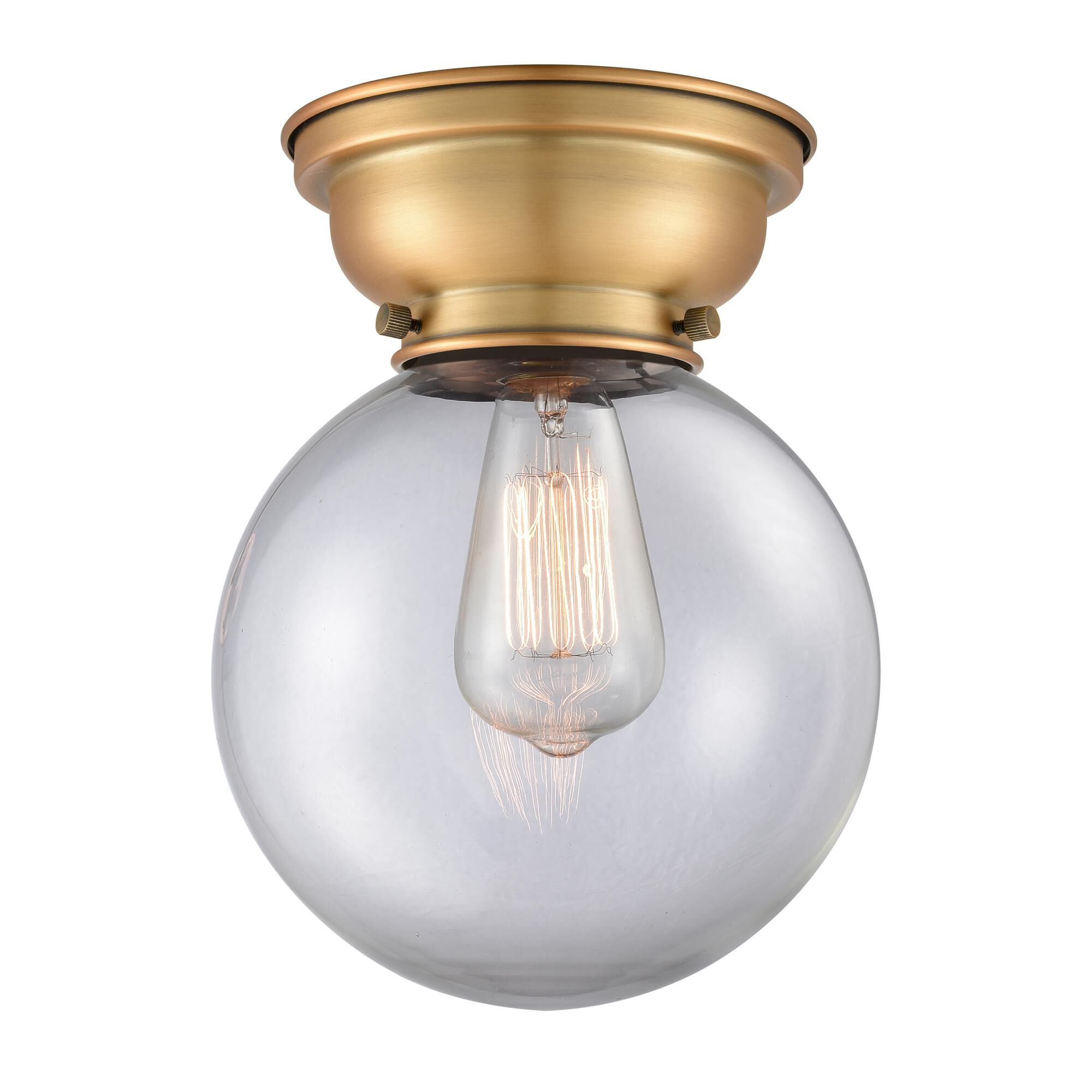 Shown in Brushed Brass finish and Clear Beacon glass