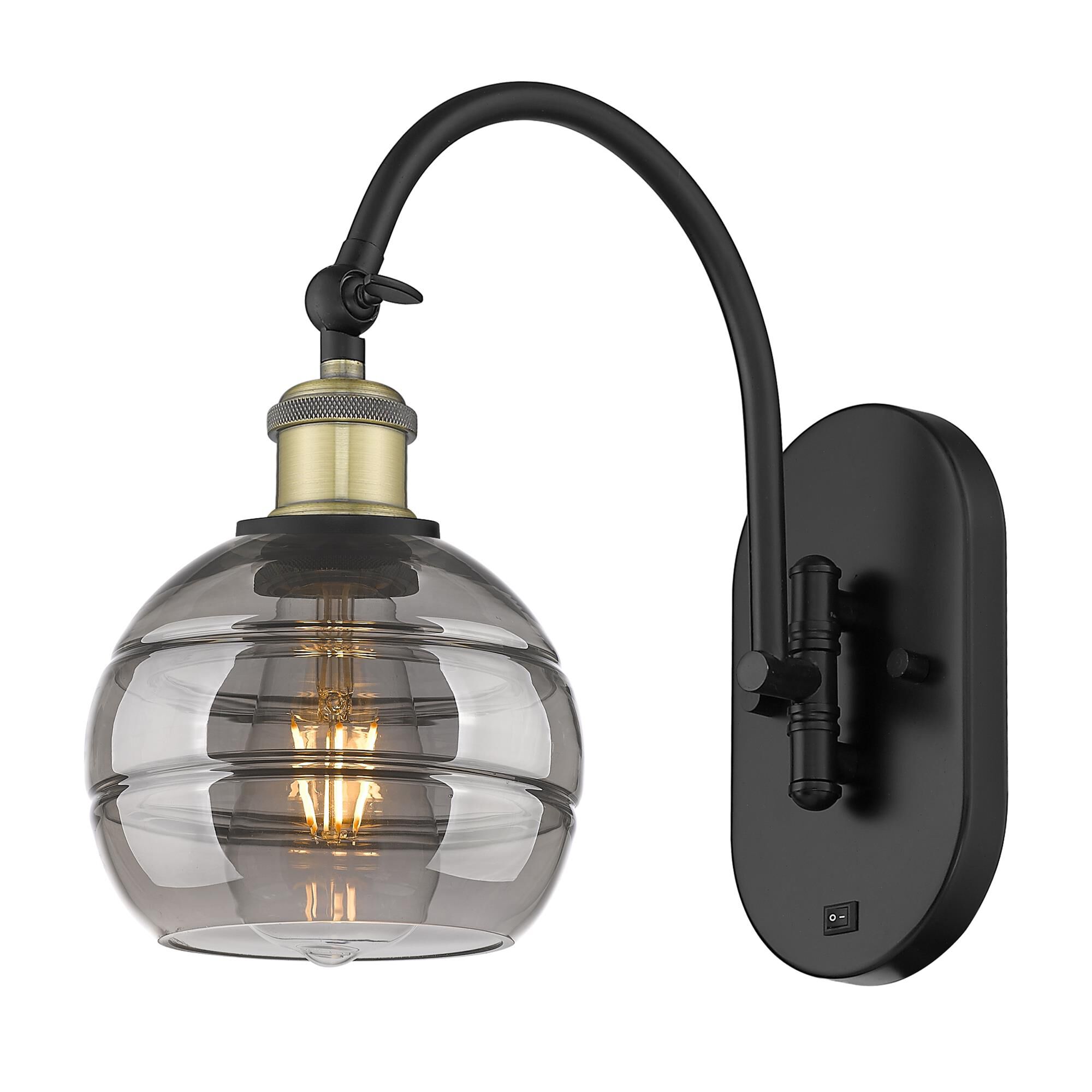 Shown in Black Antique Brass finish and Light Smoke glass