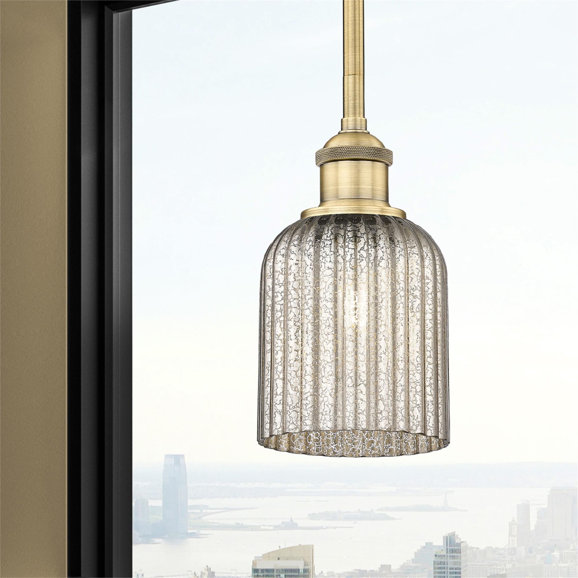 Shown in Brushed Brass finish and Mercury glass