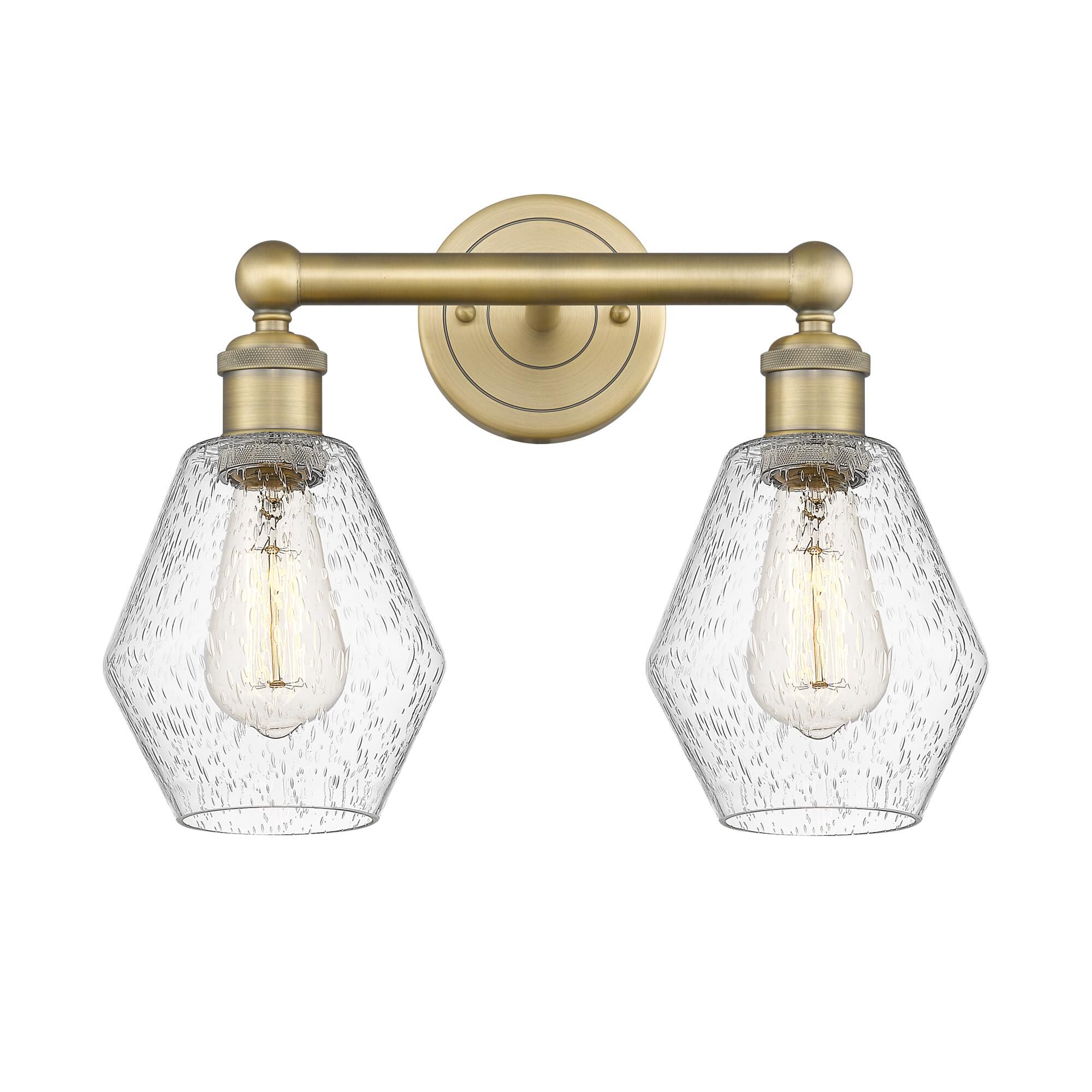 Shown in Brushed Brass finish and Seedy glass