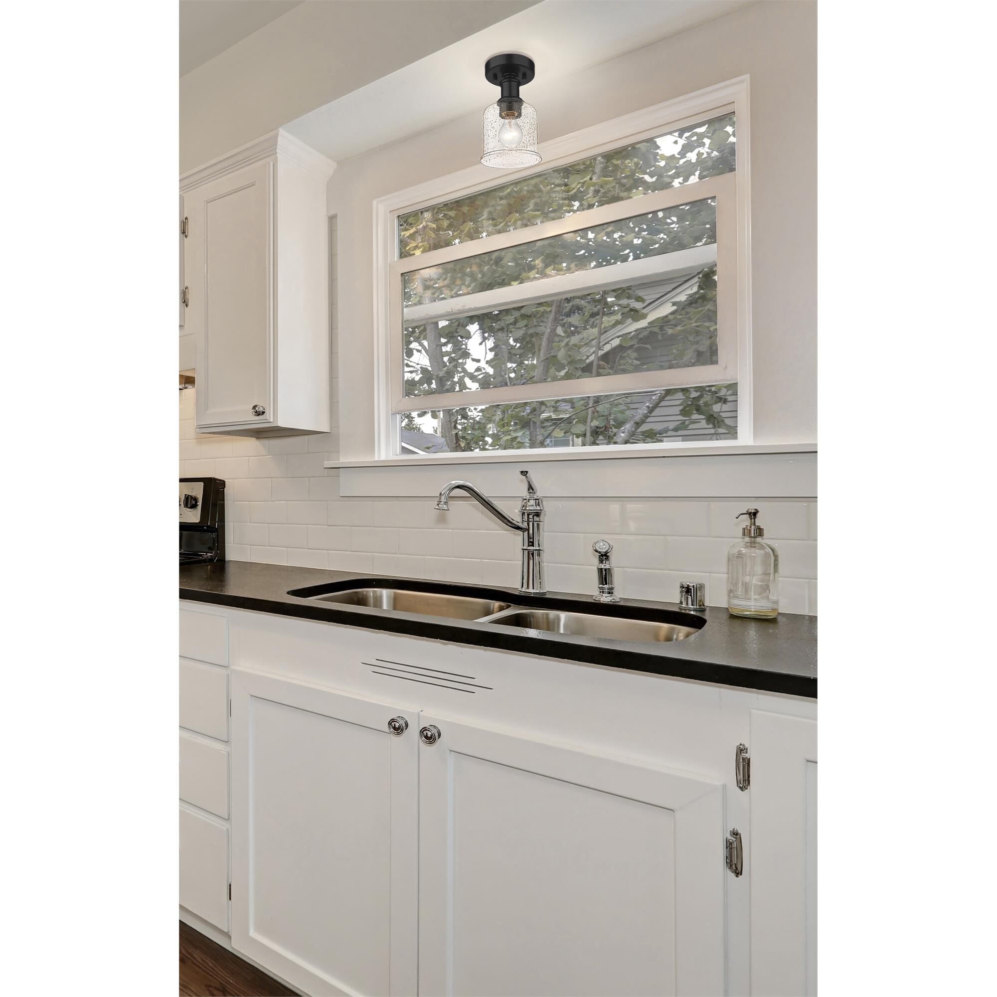 Shown in Matte Black finish and Clear Seedy glass and Clear Seedy shade