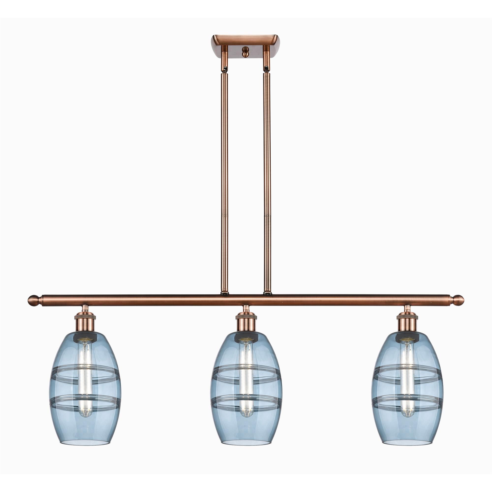 Shown in Antique Copper finish and Princess Blue glass