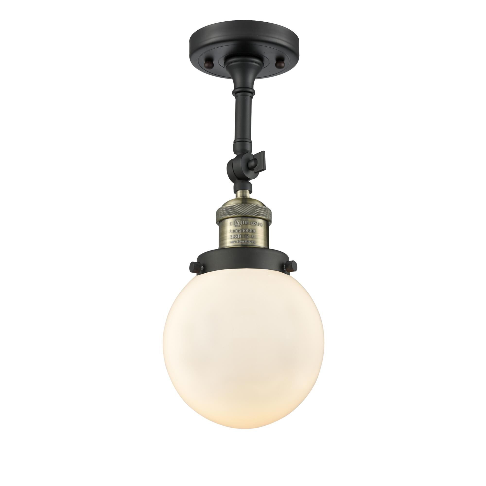 Shown in Black Antique Brass finish and Matte White Cased glass and No Accent accent