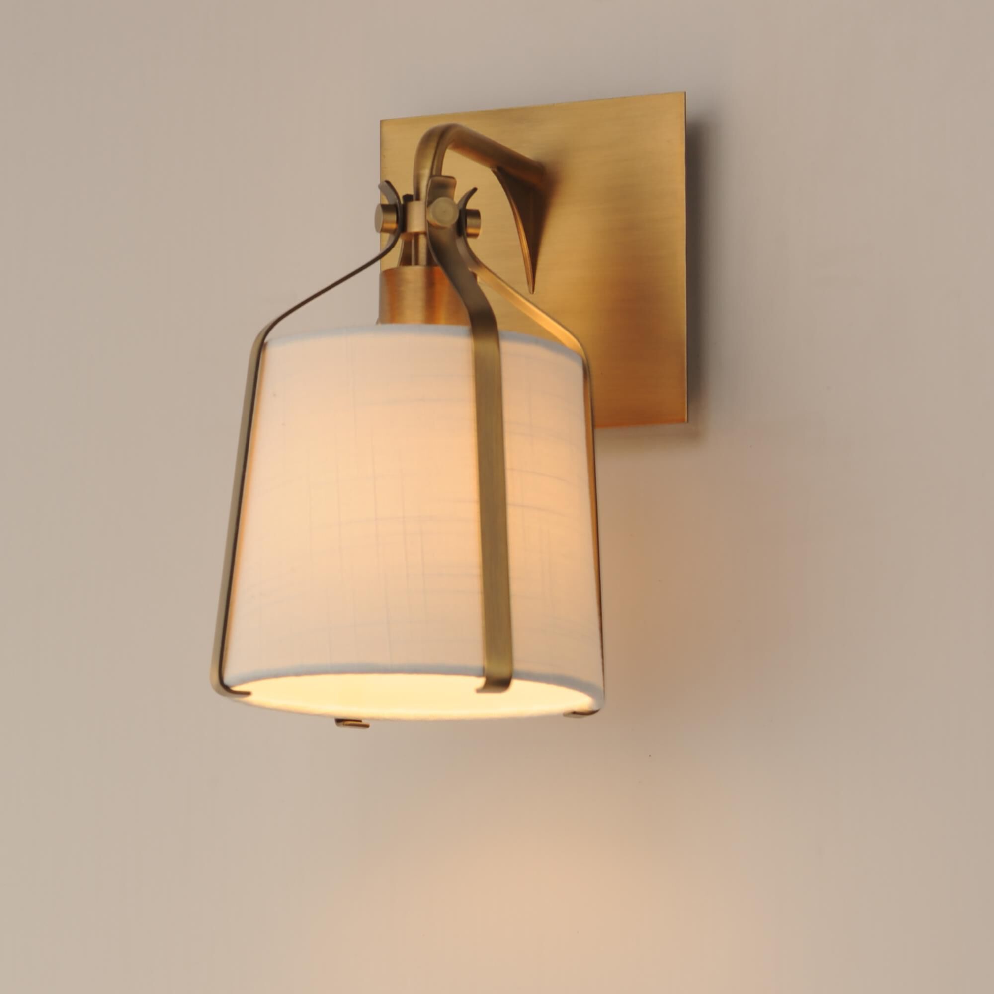 Shown in Natural Aged Brass finish and Cloth shade