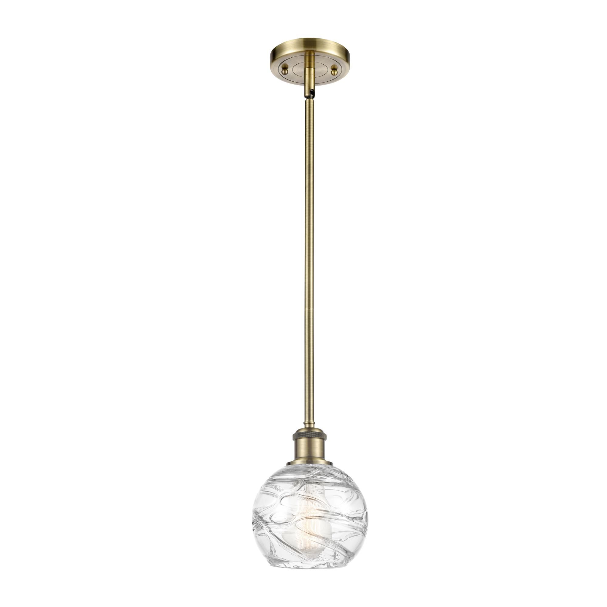 Shown in Antique Brass finish and Sphere glass and Glass shade