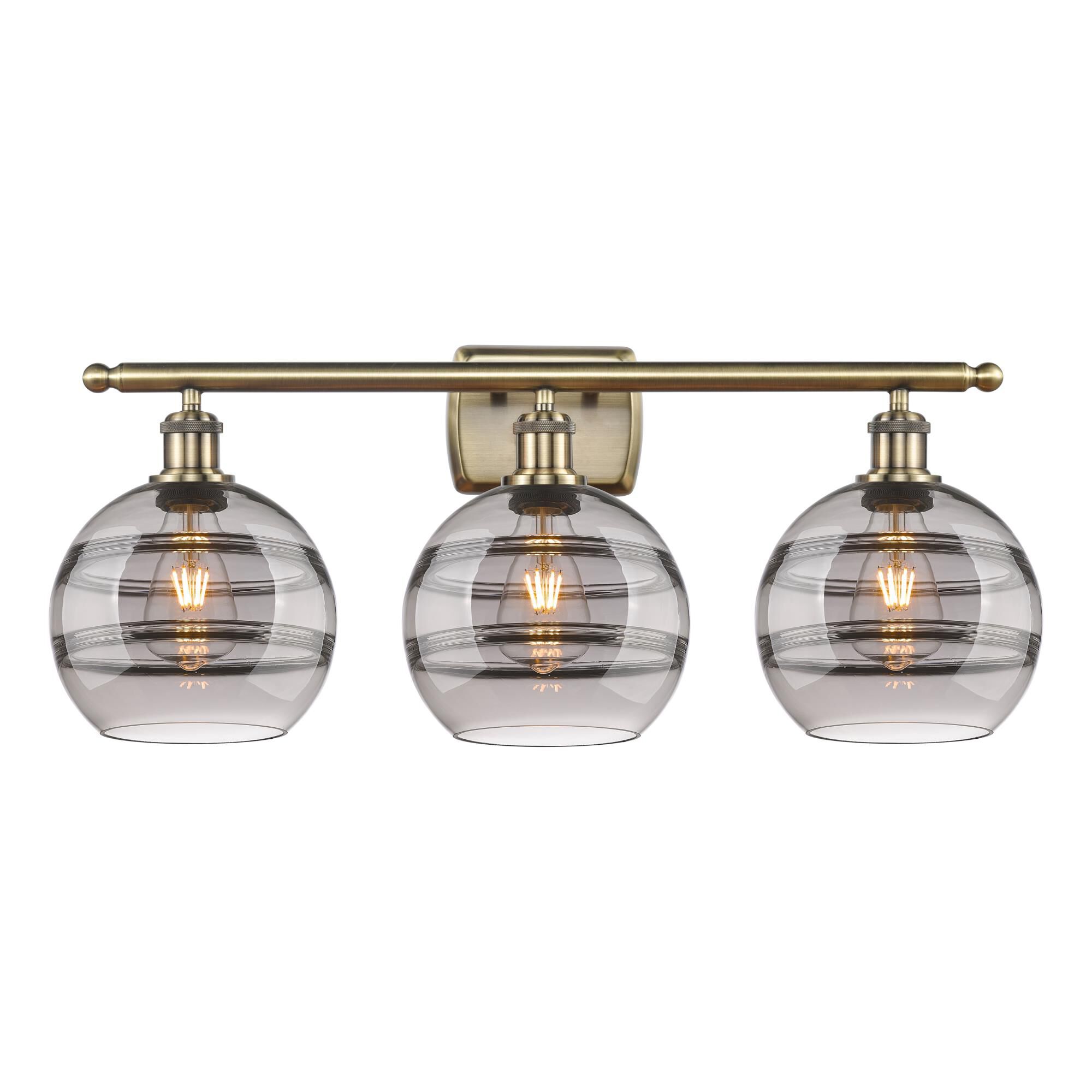 Shown in Antique Brass finish and Light Smoke glass