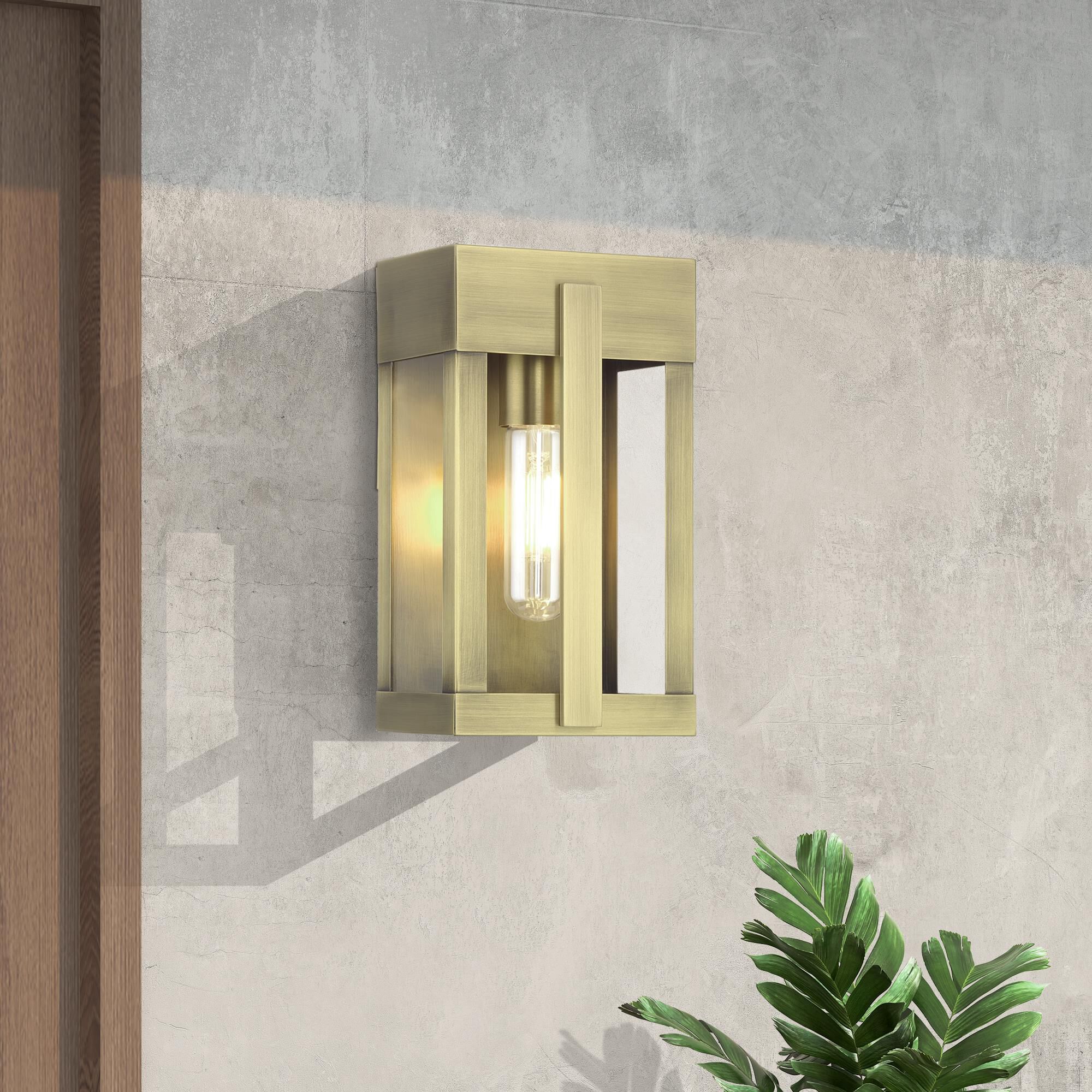 Shown in Antique Brass finish and Clear glass