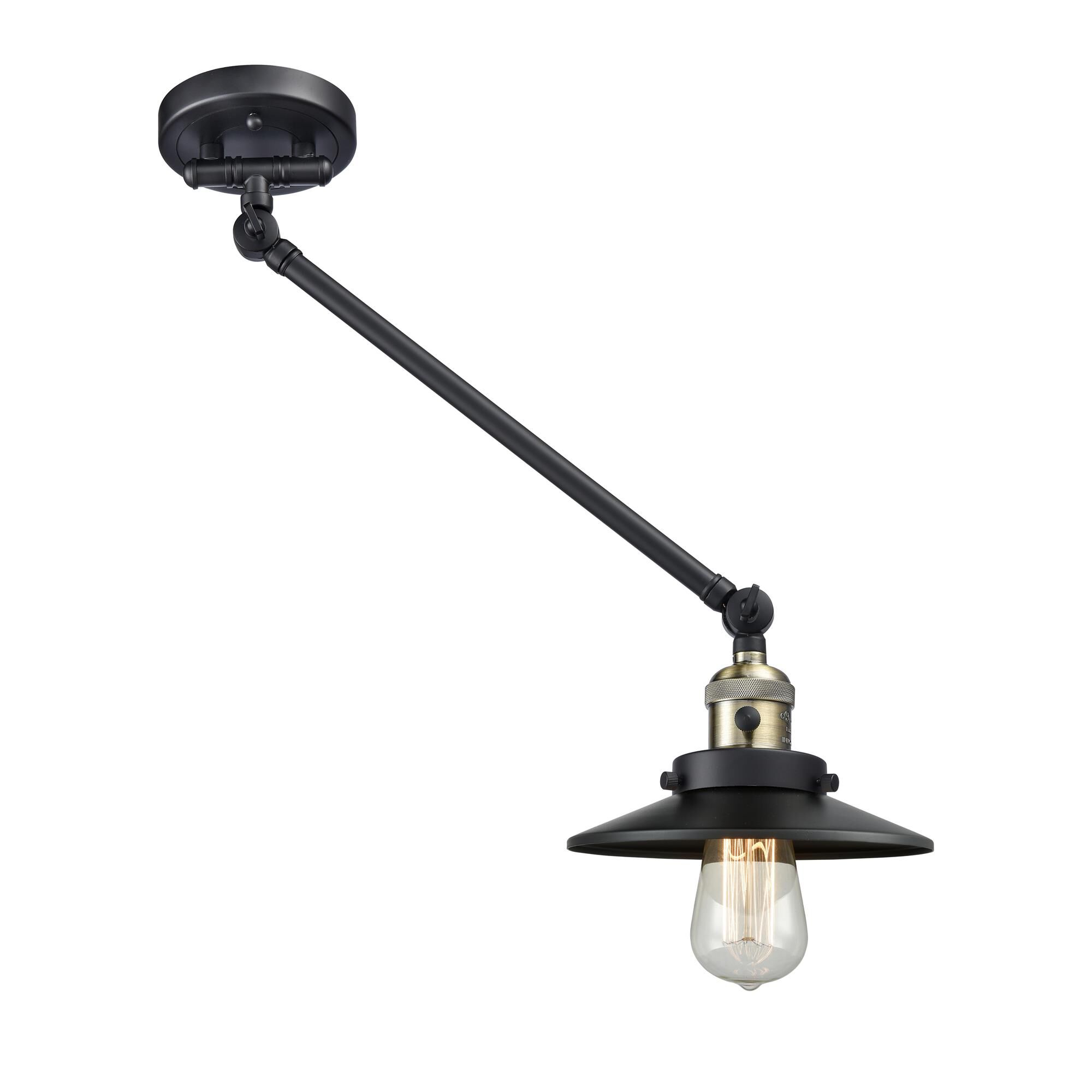 Shown in Black Antique Brass finish and Matte Black shade