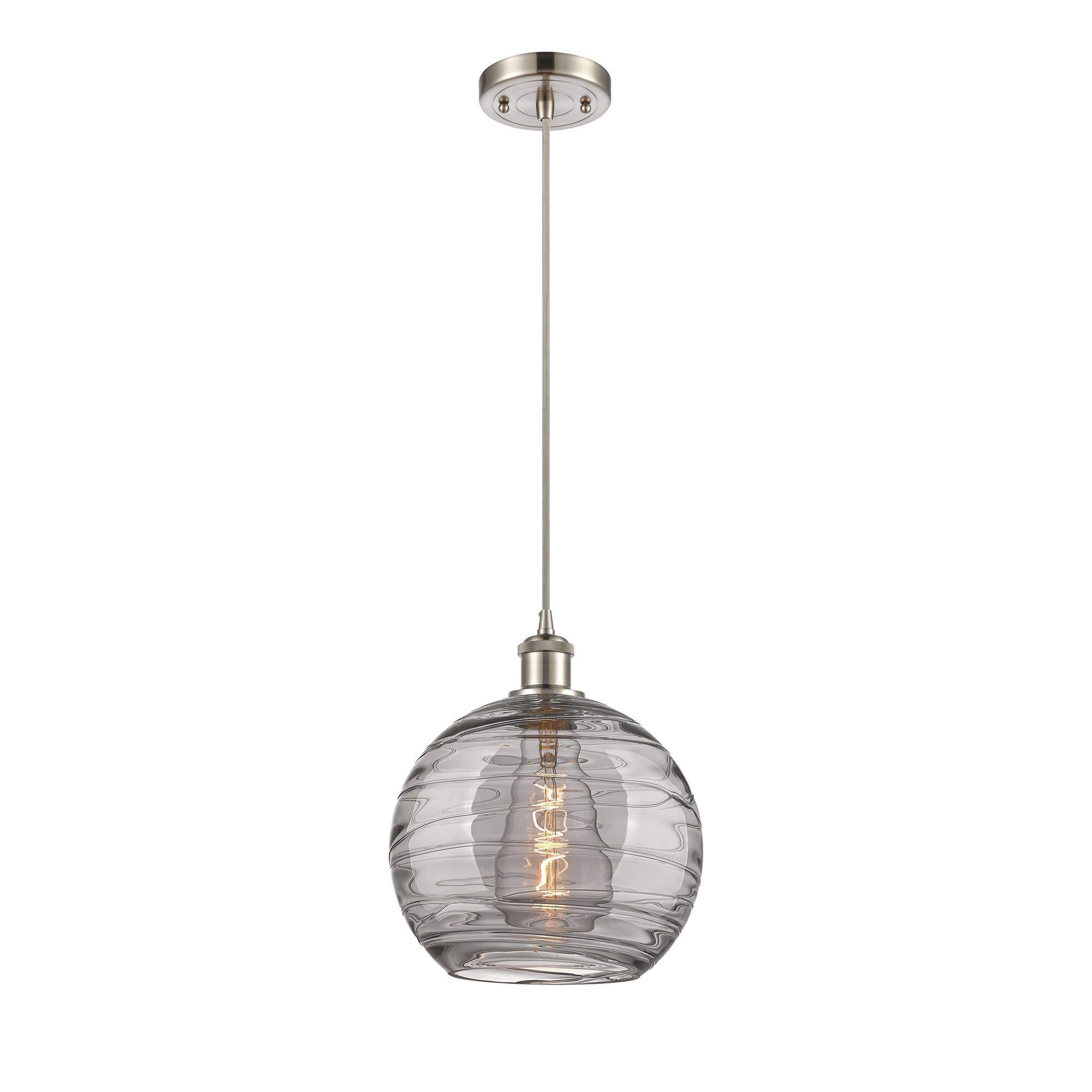 Shown in Brushed Satin Nickel finish and Light Smoke Deco Swirl glass