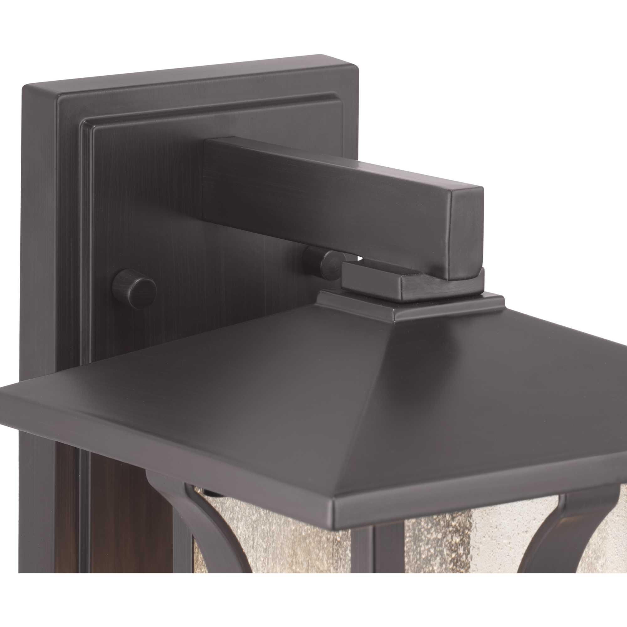 Shown in Antique Bronze finish and Clear Seeded glass