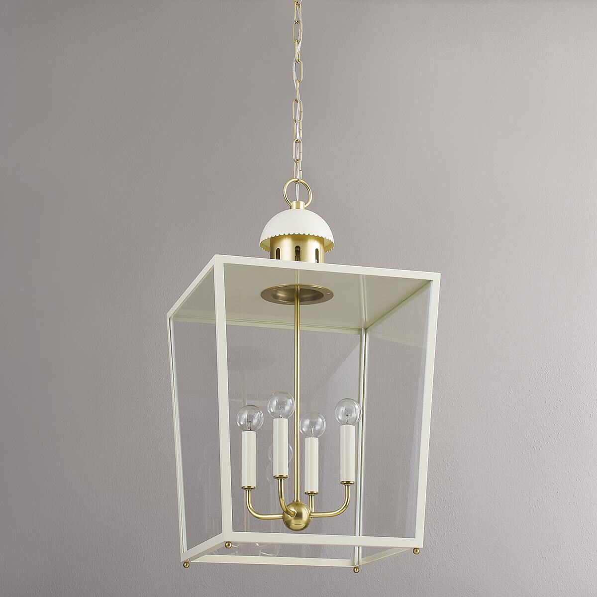 Shown in Aged Brass and Soft Cream finish and Clear glass