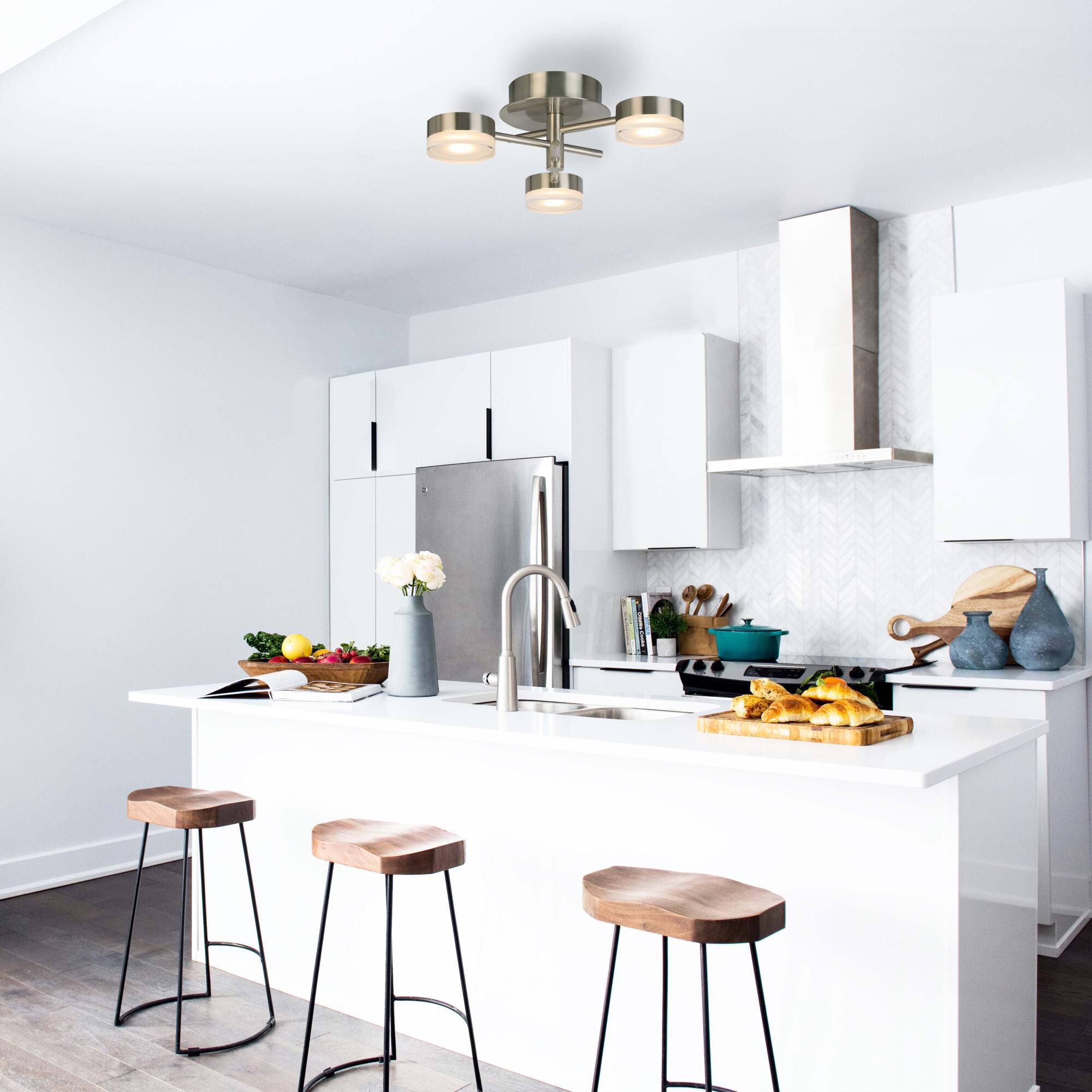 Shown in Brushed Nickel finish and White Acrylic shade