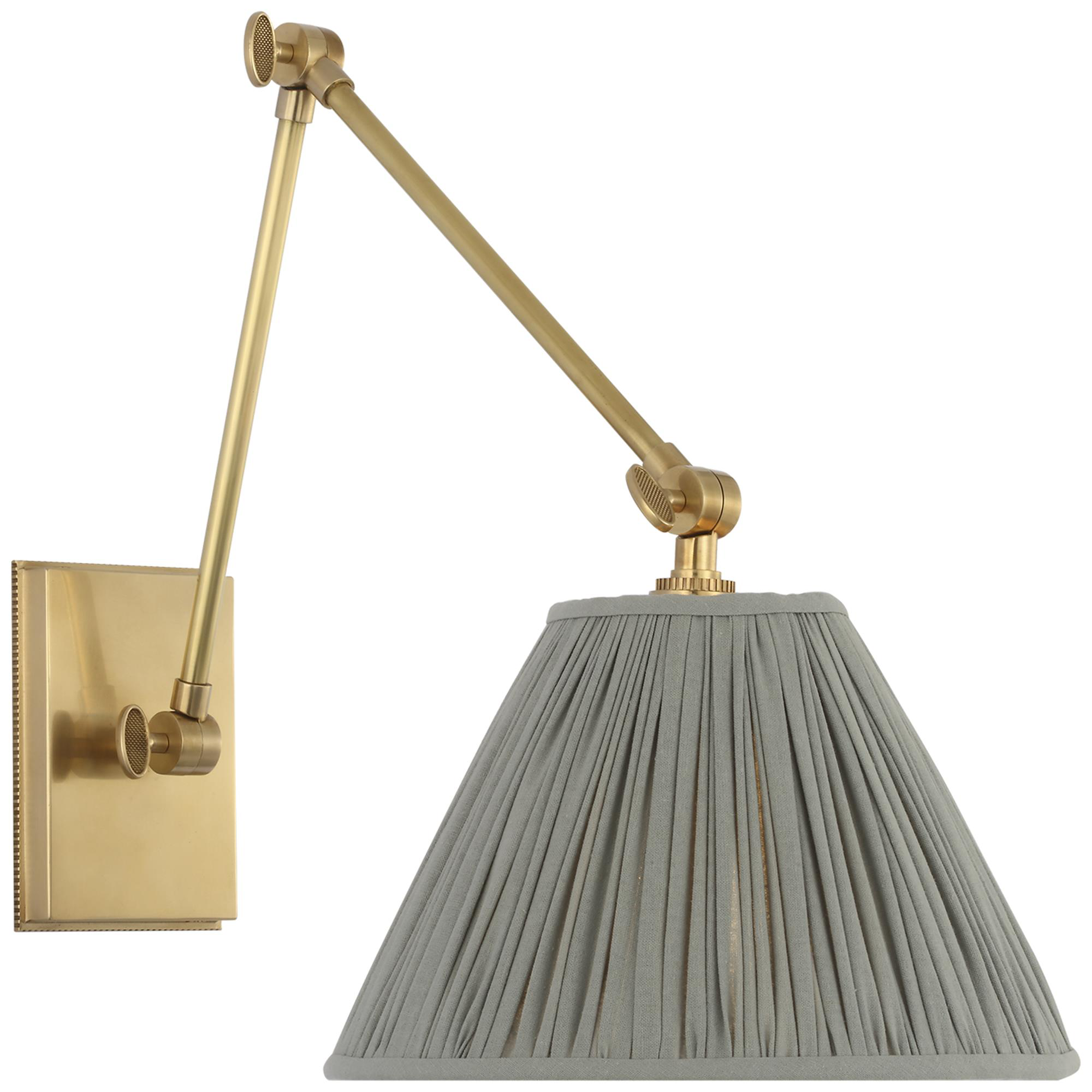 Shown in Soft Brass finish and Blue Linen Pleated shade
