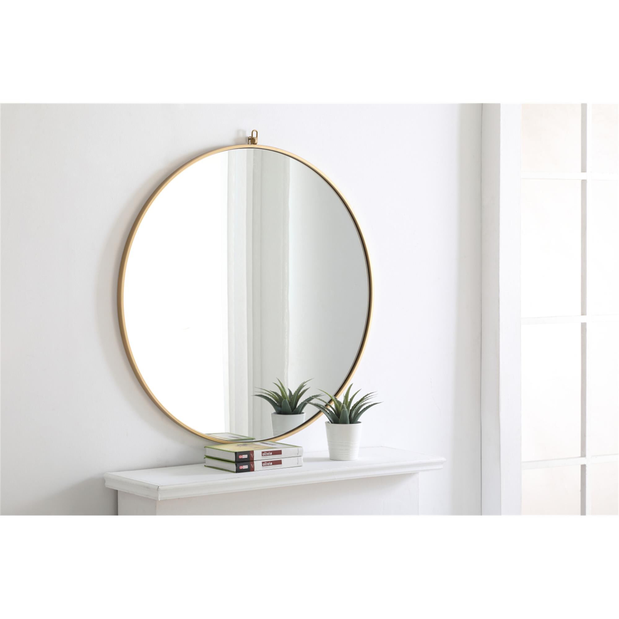 Shown in Brass finish and Clear Mirror Beveled glass