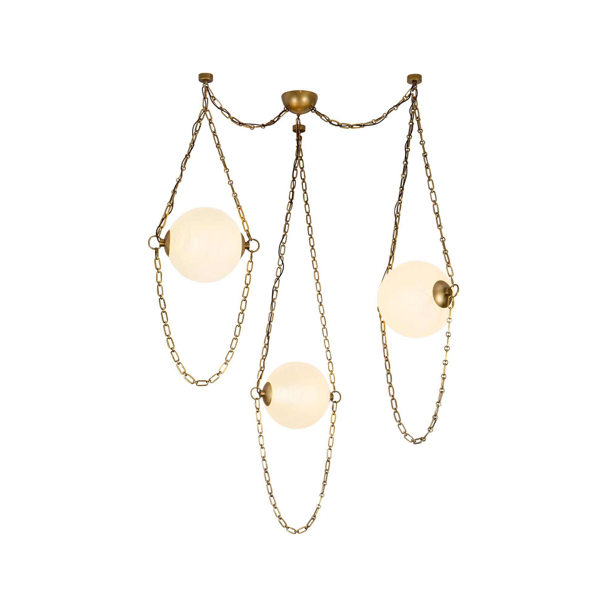 Shown in Vintage Brass finish and Cloud glass