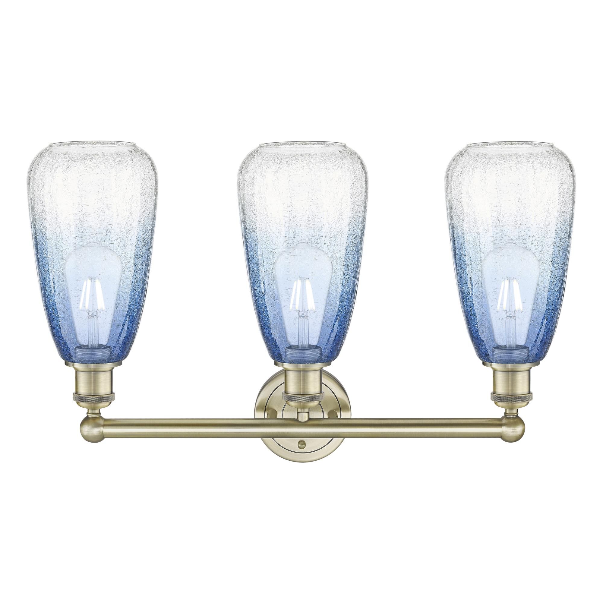 Shown in Antique Brass finish and Sapphire Blue glass