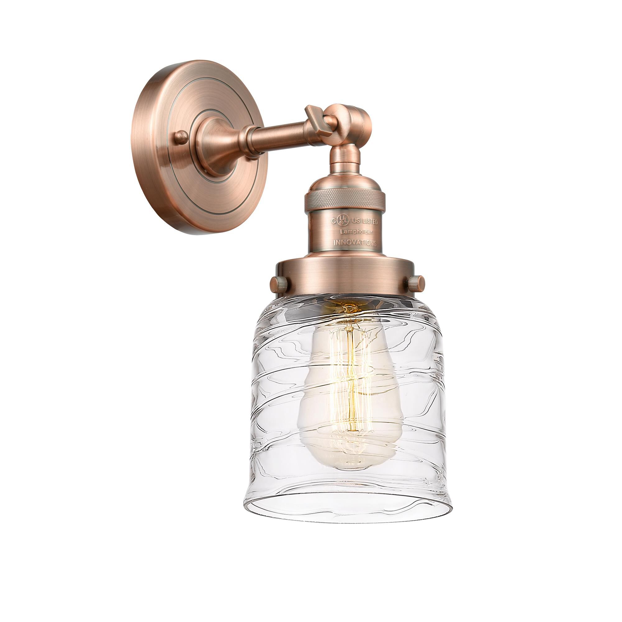 Shown in Antique Copper finish and Clear Deco Swirl Small Bell glass