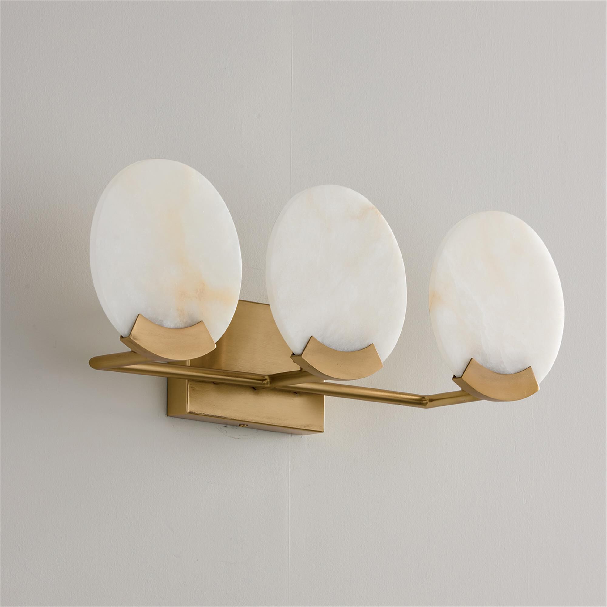 Shown in Aged Brass finish and Natural Alabaster Stone glass