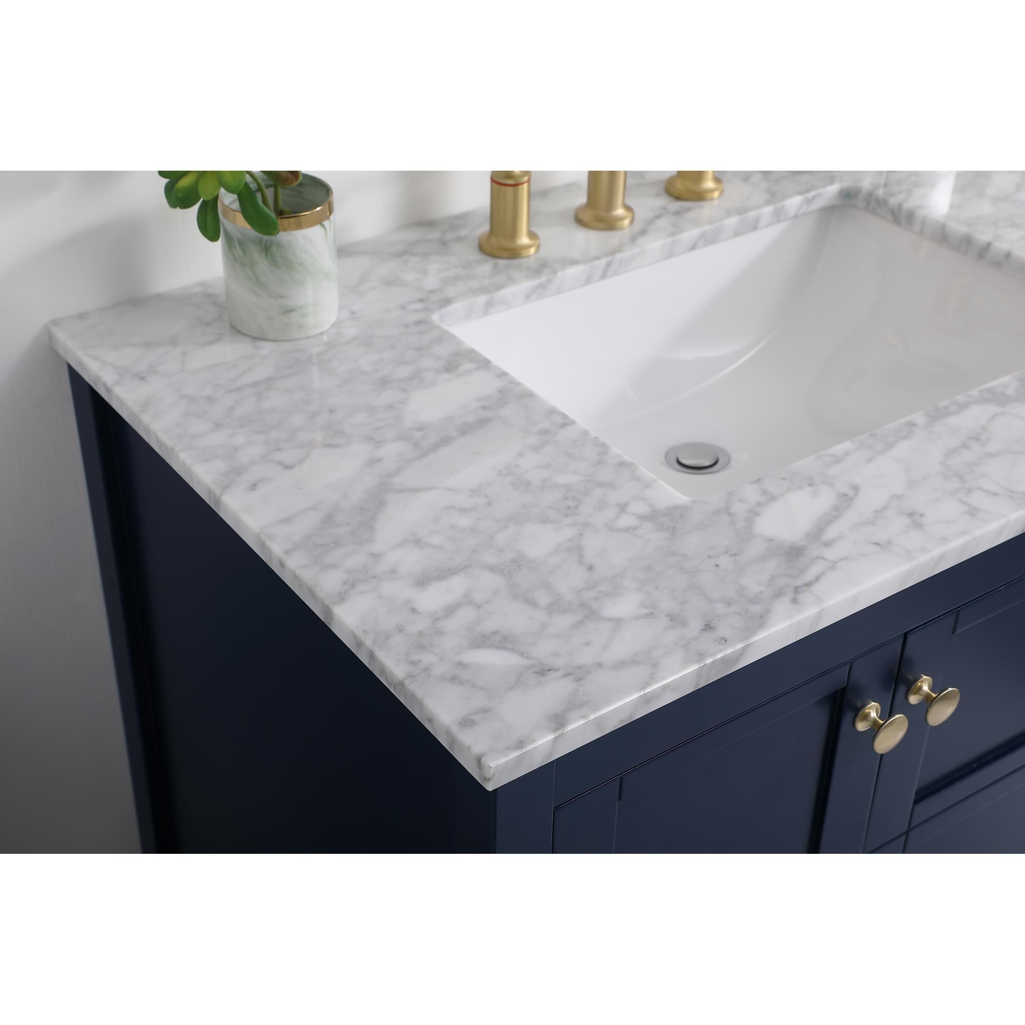 Shown in Blue And Gold With Carrara White Marble finish