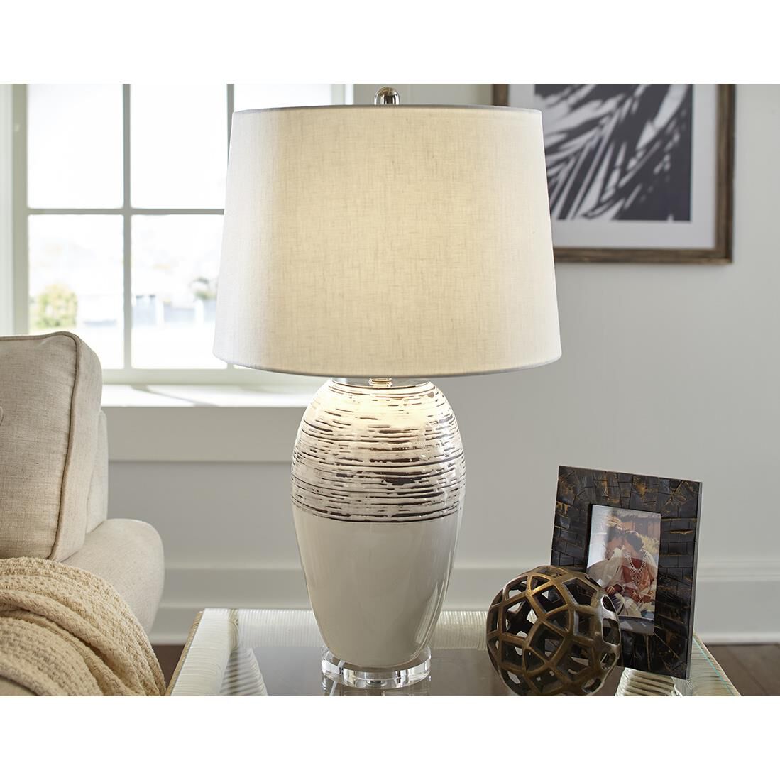 Shown in Polished Nickel finish and Seasalt glass and Seasalt Linen Tapered Drum shade