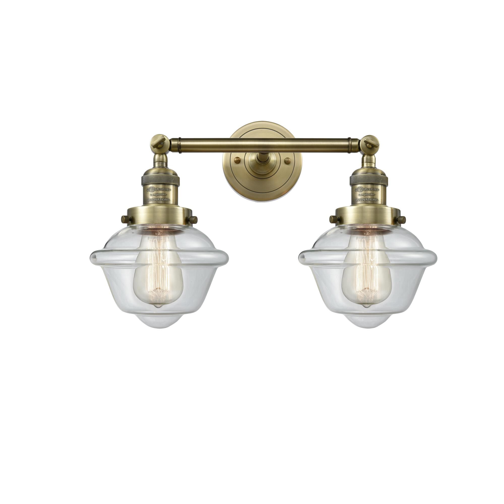 Shown in Antique Brass finish and Clear glass