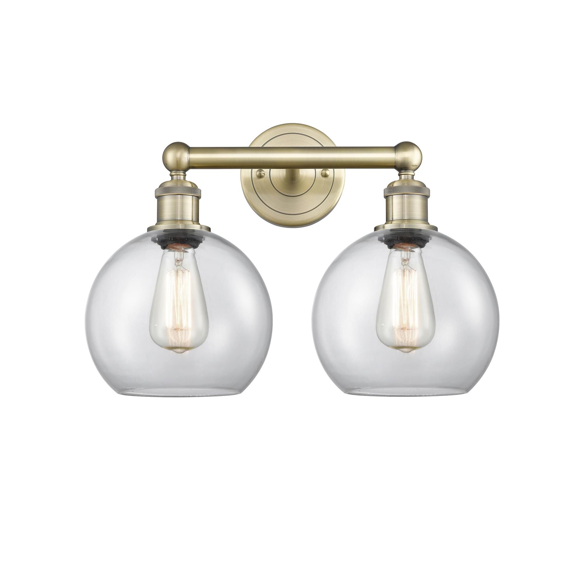 Shown in Antique Brass finish and Clear glass