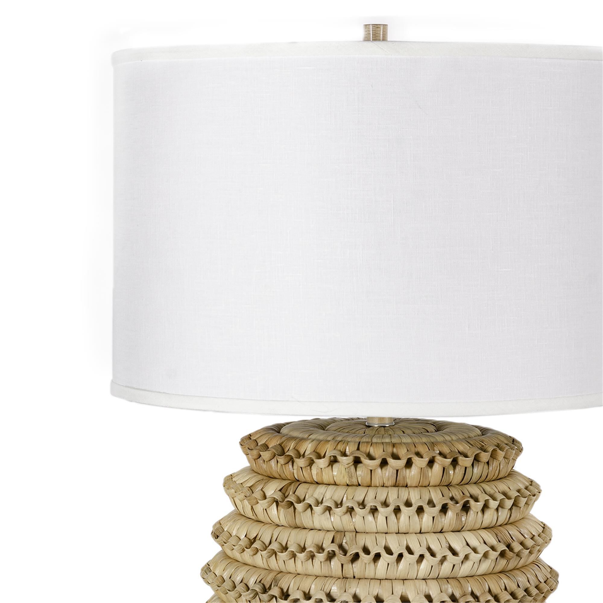 Shown in Natural Inlaid Banana Leaf  finish and Textured Cream Linen shade