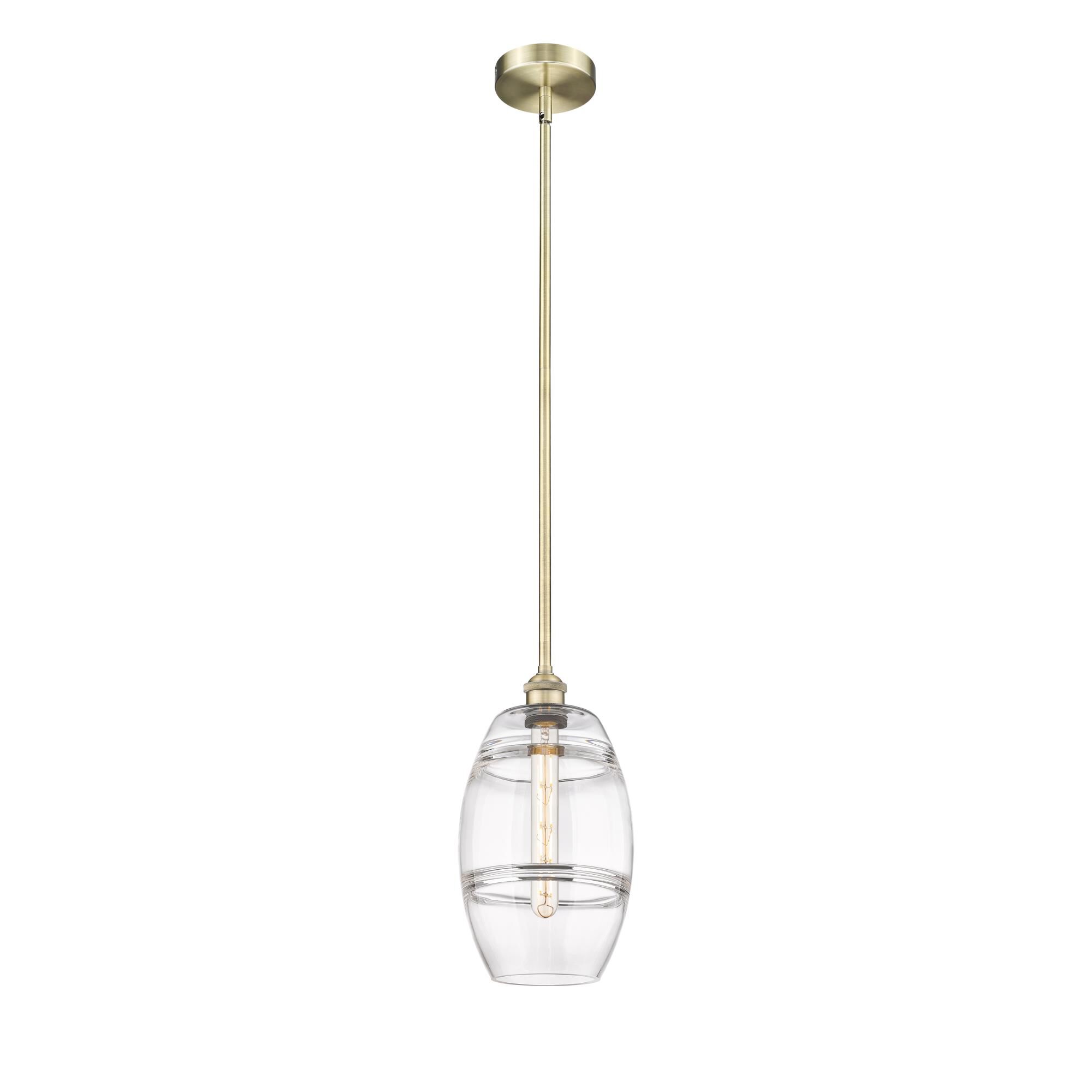 Shown in Antique Brass finish and Clear glass