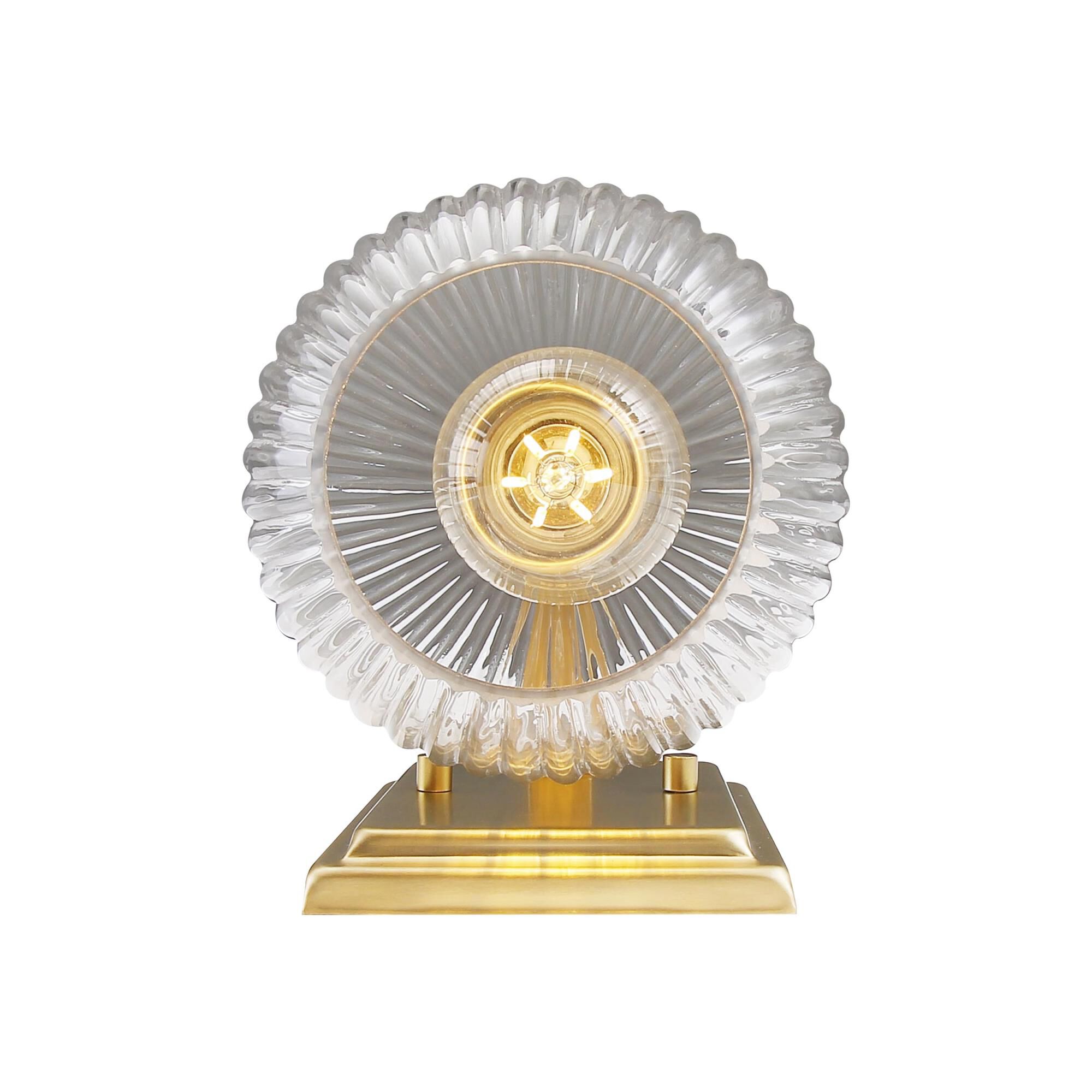 Shown in Brushed Champagne Bronze finish and Ribbed Clear Glass shade