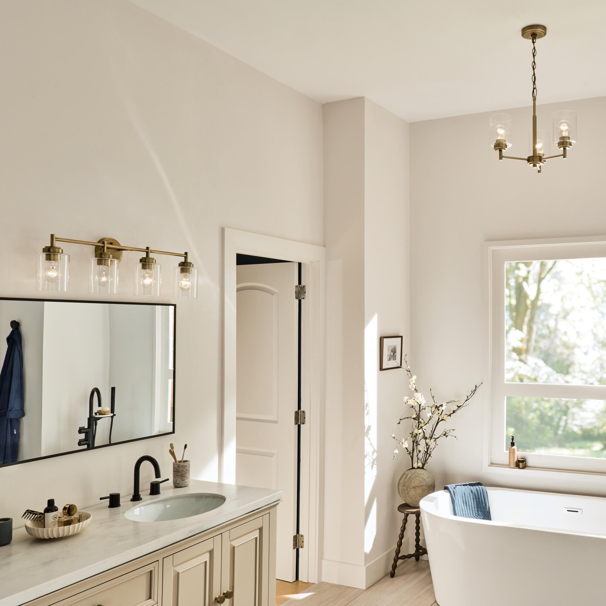 Shown in Natural Brass finish and Clear Seeded glass