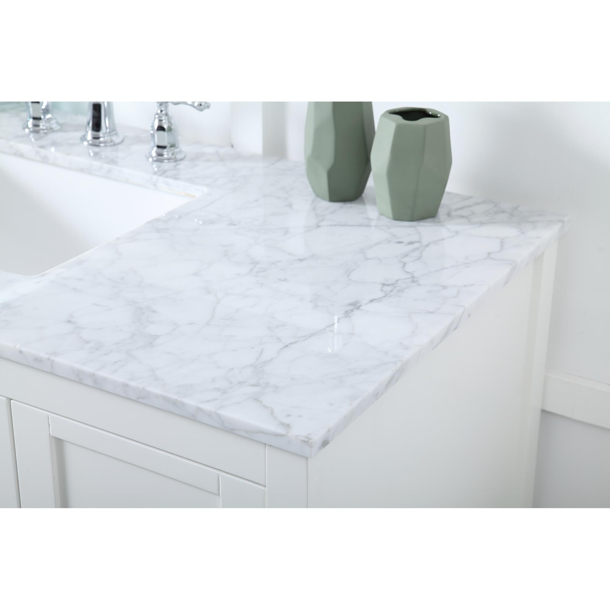 Shown in White And Brushed Nickel With Carrara White Marble finish