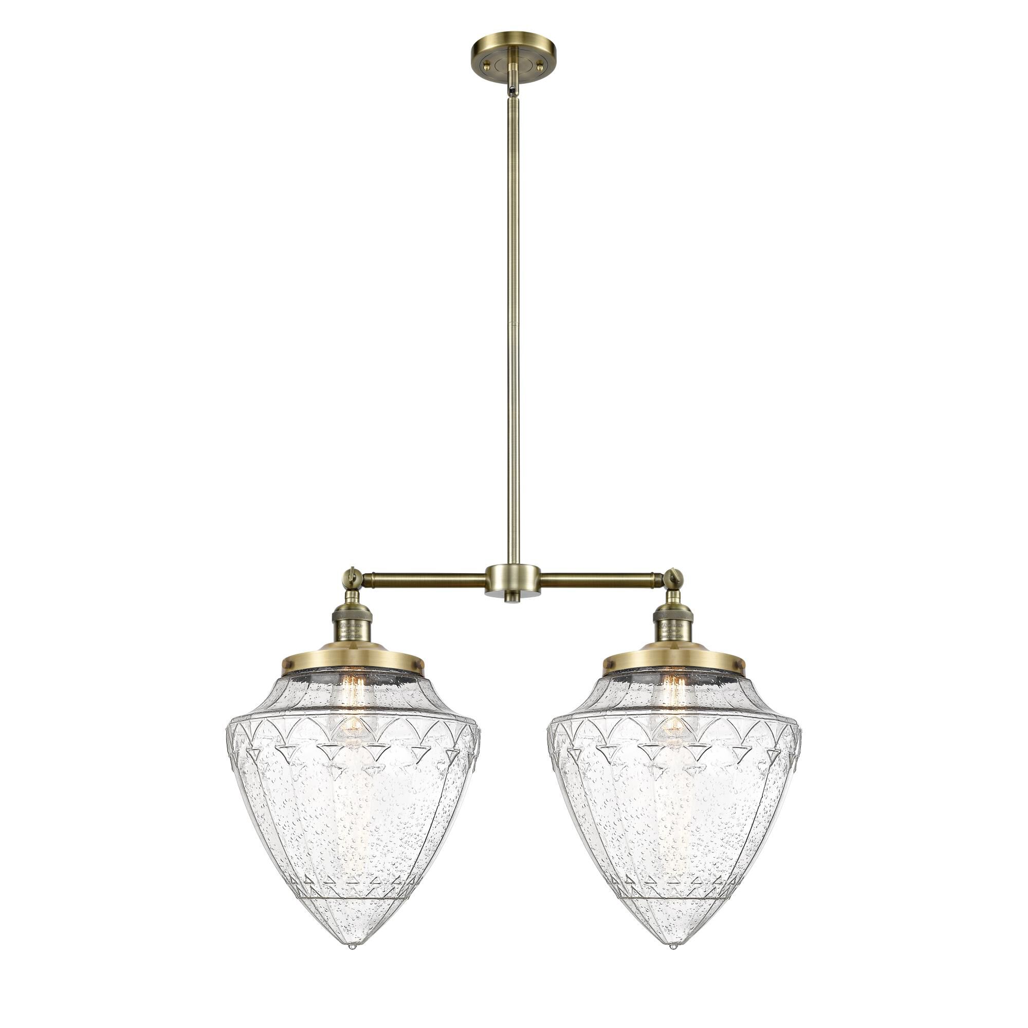 Shown in Antique Brass finish and Seedy glass