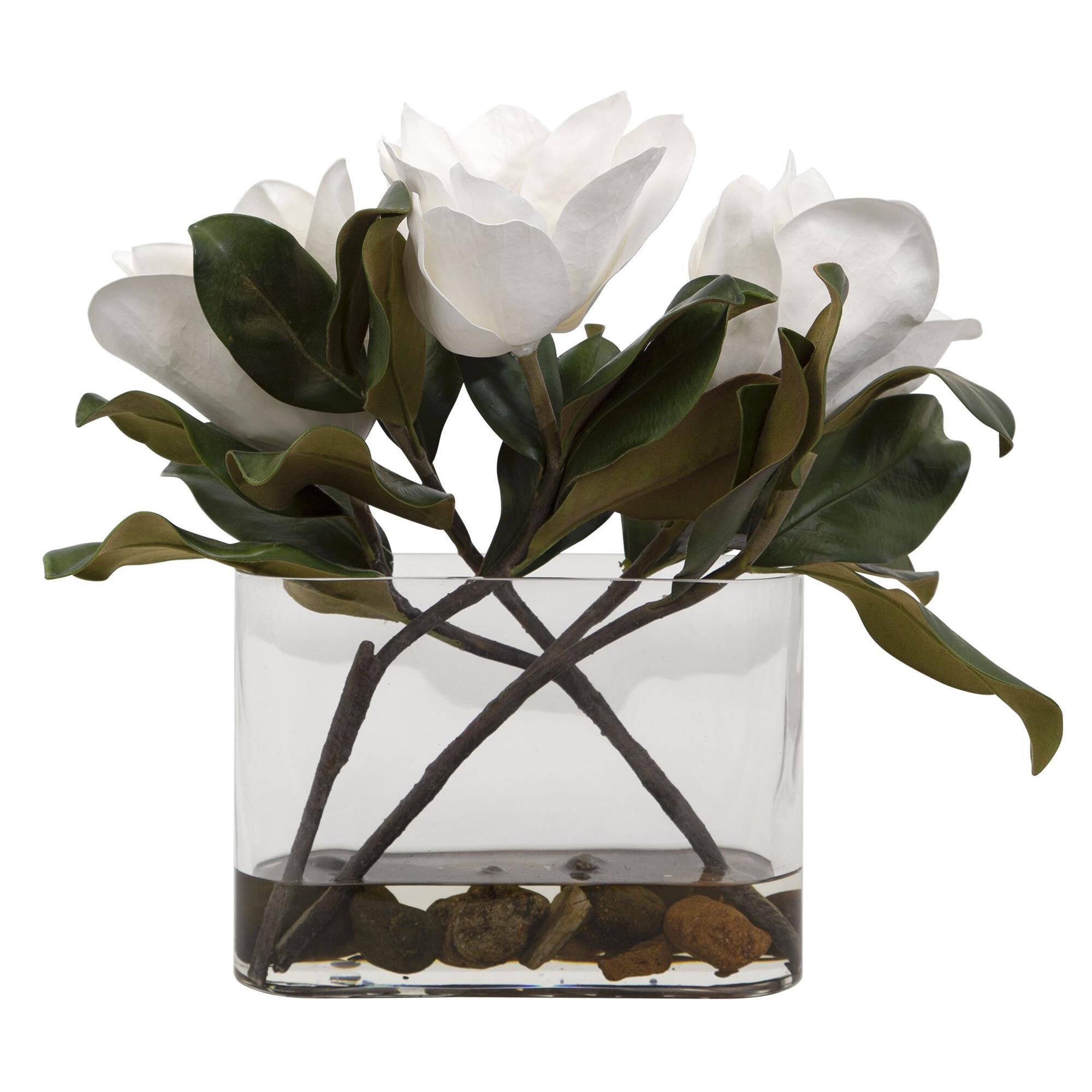 Shown in A Trio Of White Magnolia Blooms Are Placed In A Clear Glass Vase With Faux Water And Natural River S finish