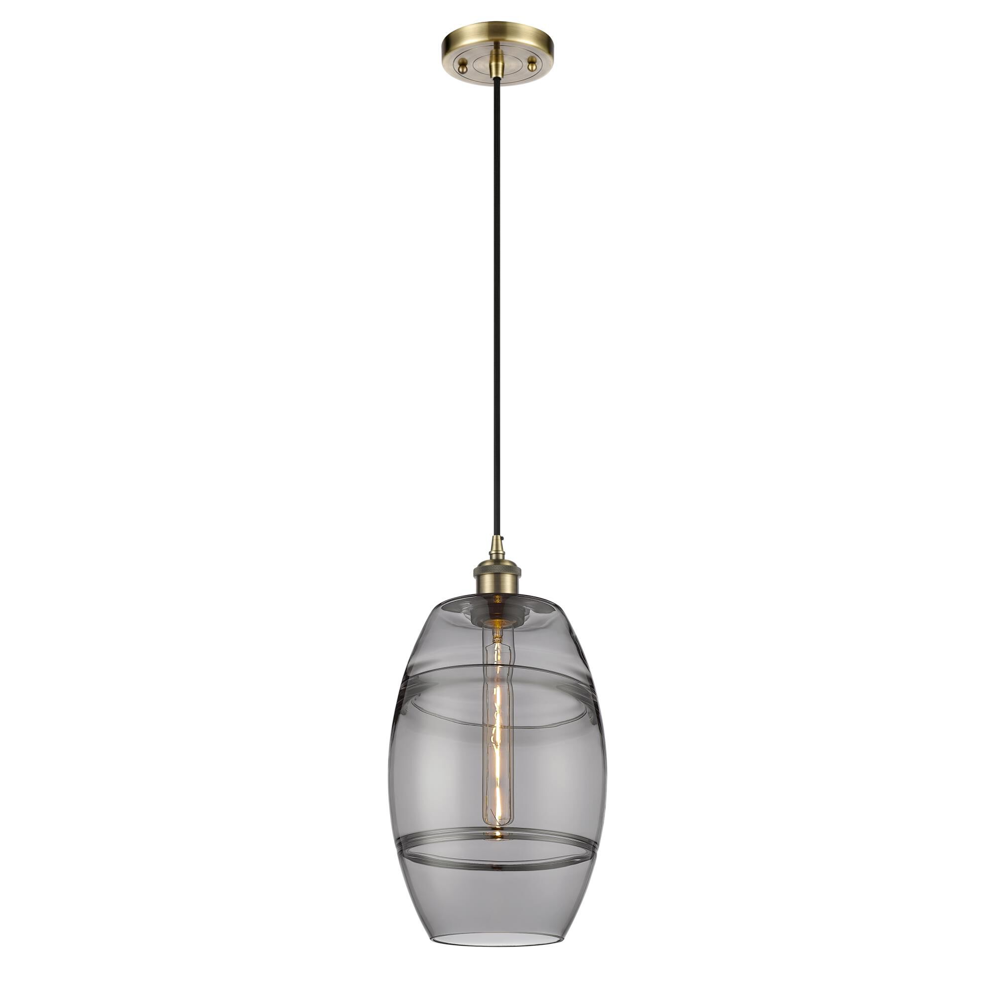 Shown in Antique Brass finish and Light Smoke glass