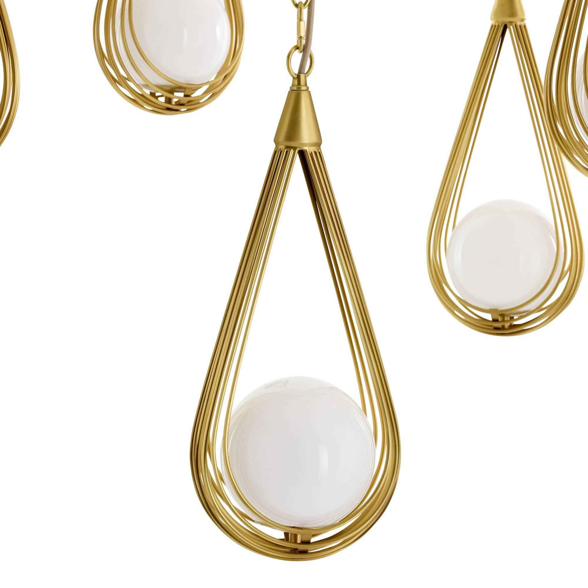 Shown in Antique Brass finish and Opal glass