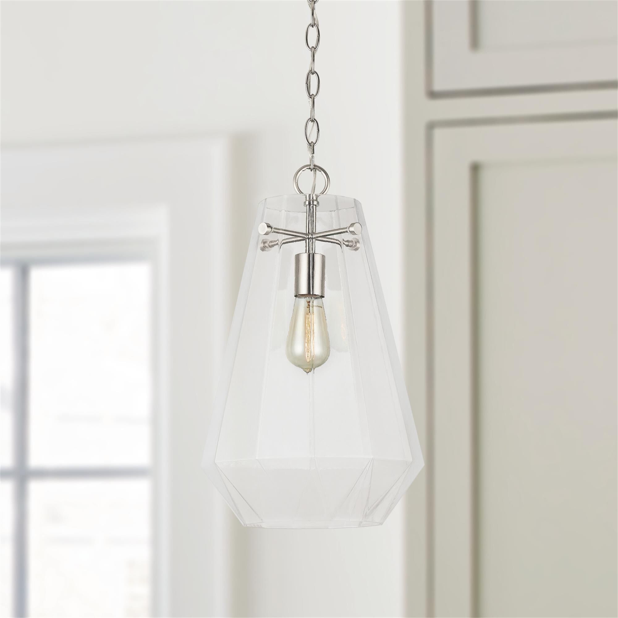 Shown in Brushed Nickel finish and Clear Prismatic glass