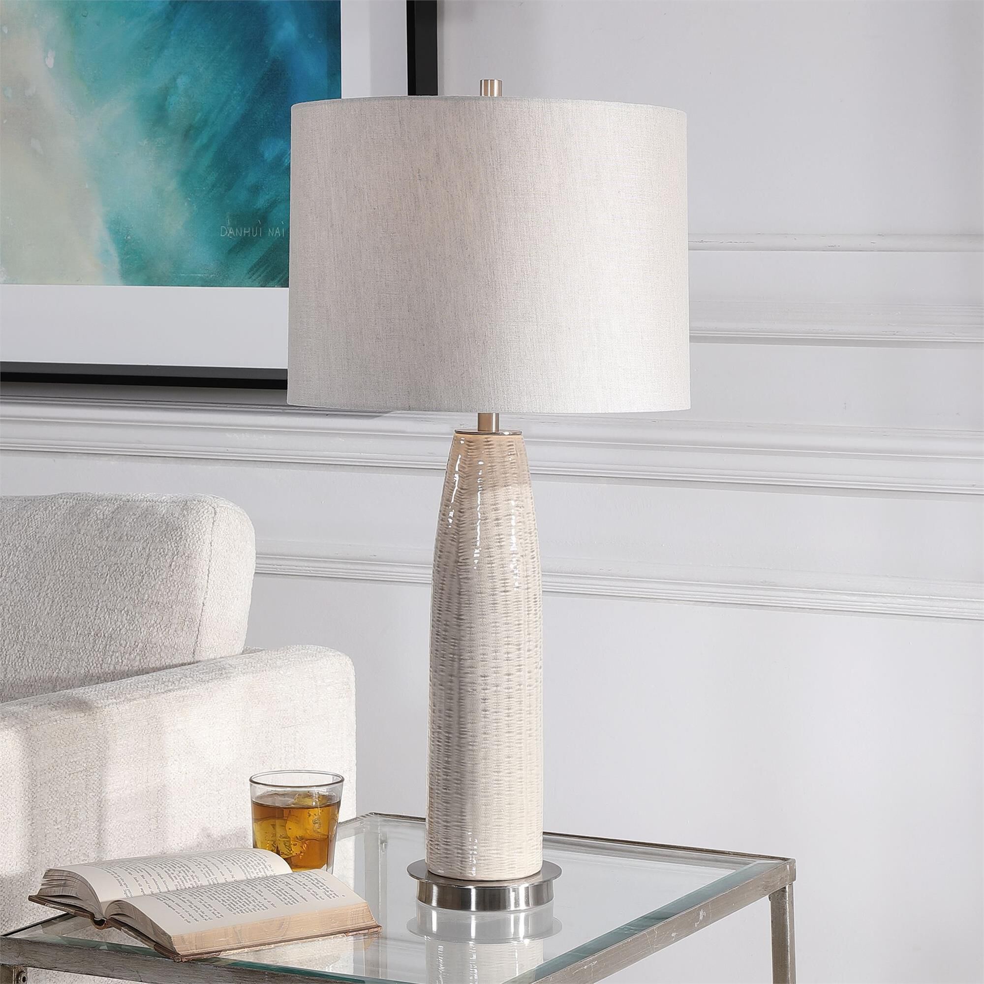 Shown in This Ceramic Base Keeps It Simple Yet Upscale With A Fashionable Pattern Finished In A Distressed Li finish and Round Drum Hardback shade