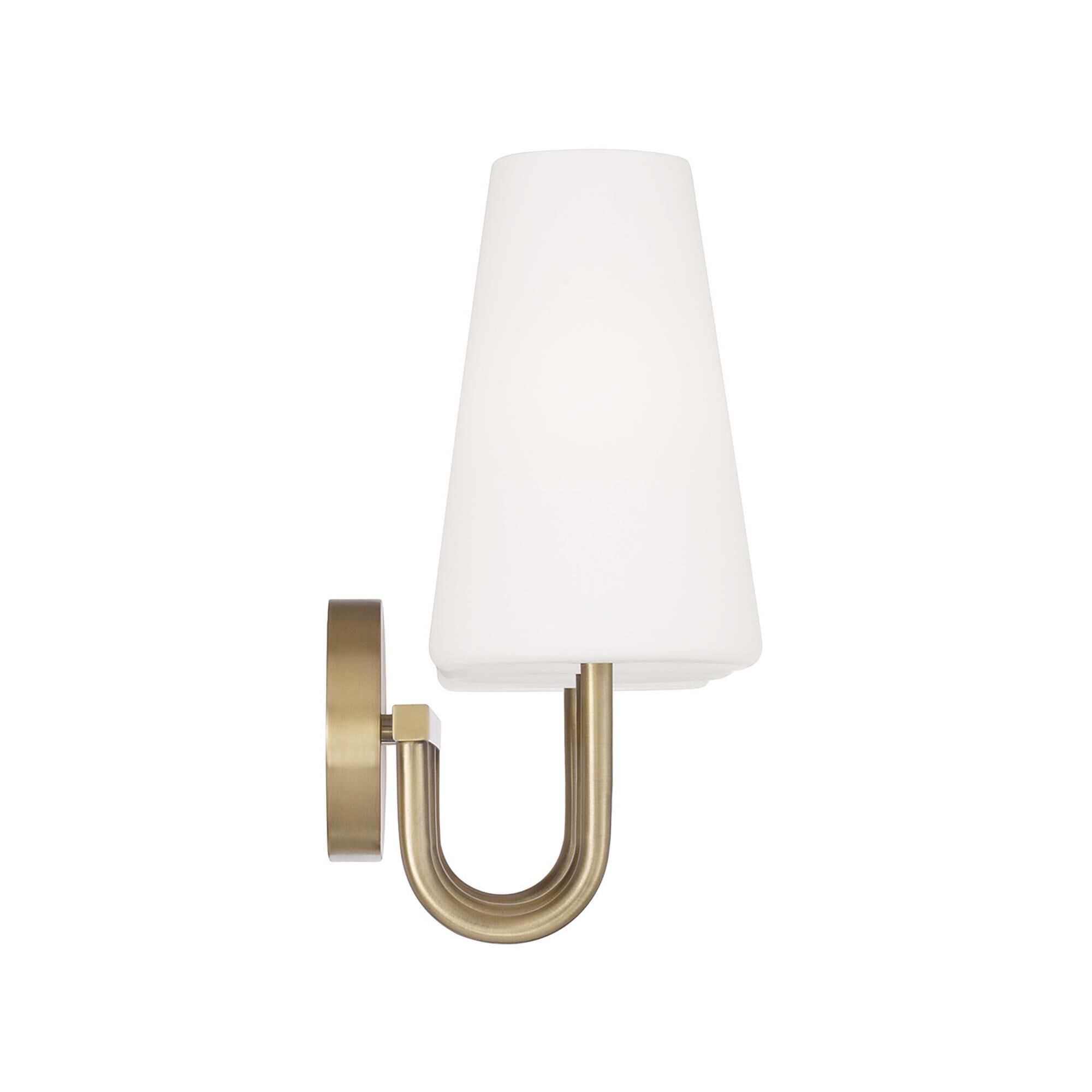 Shown in Aged Brass finish and Soft White glass