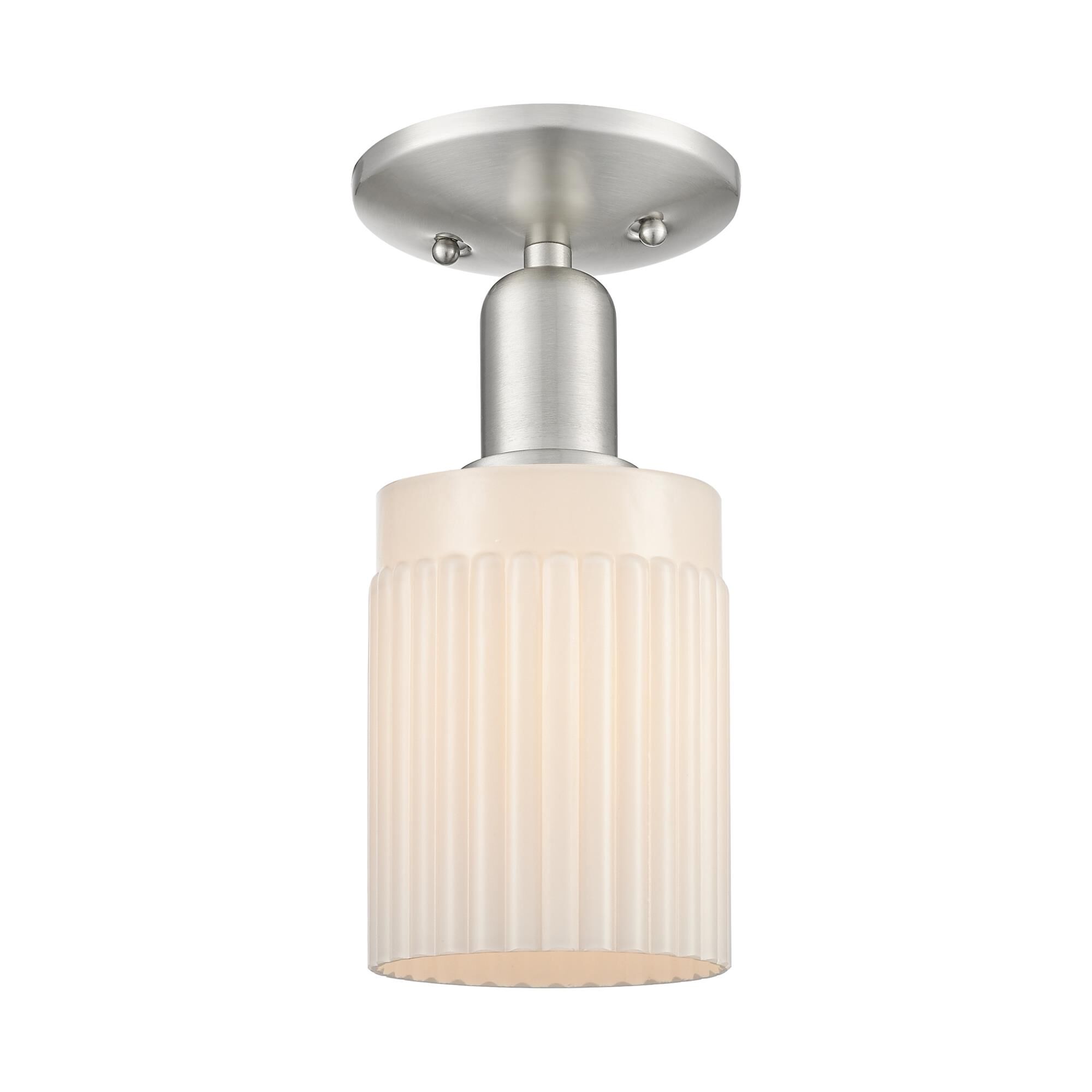 Shown in Brushed Satin Nickel finish and Matte White glass