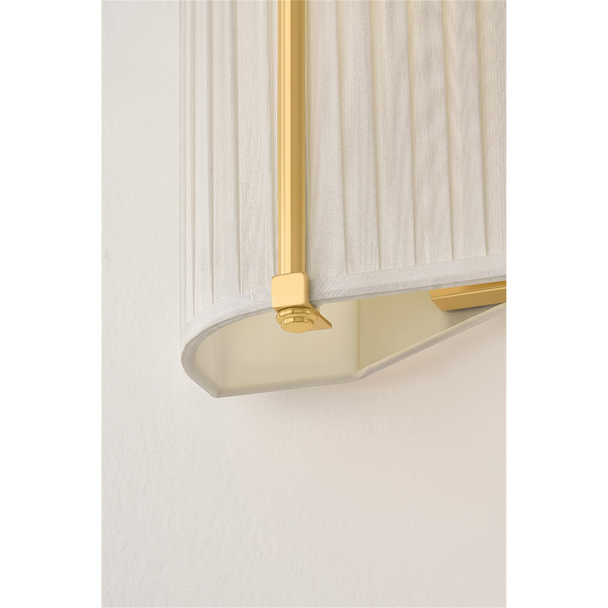 Shown in Aged Brass finish and Ivory Silk shade