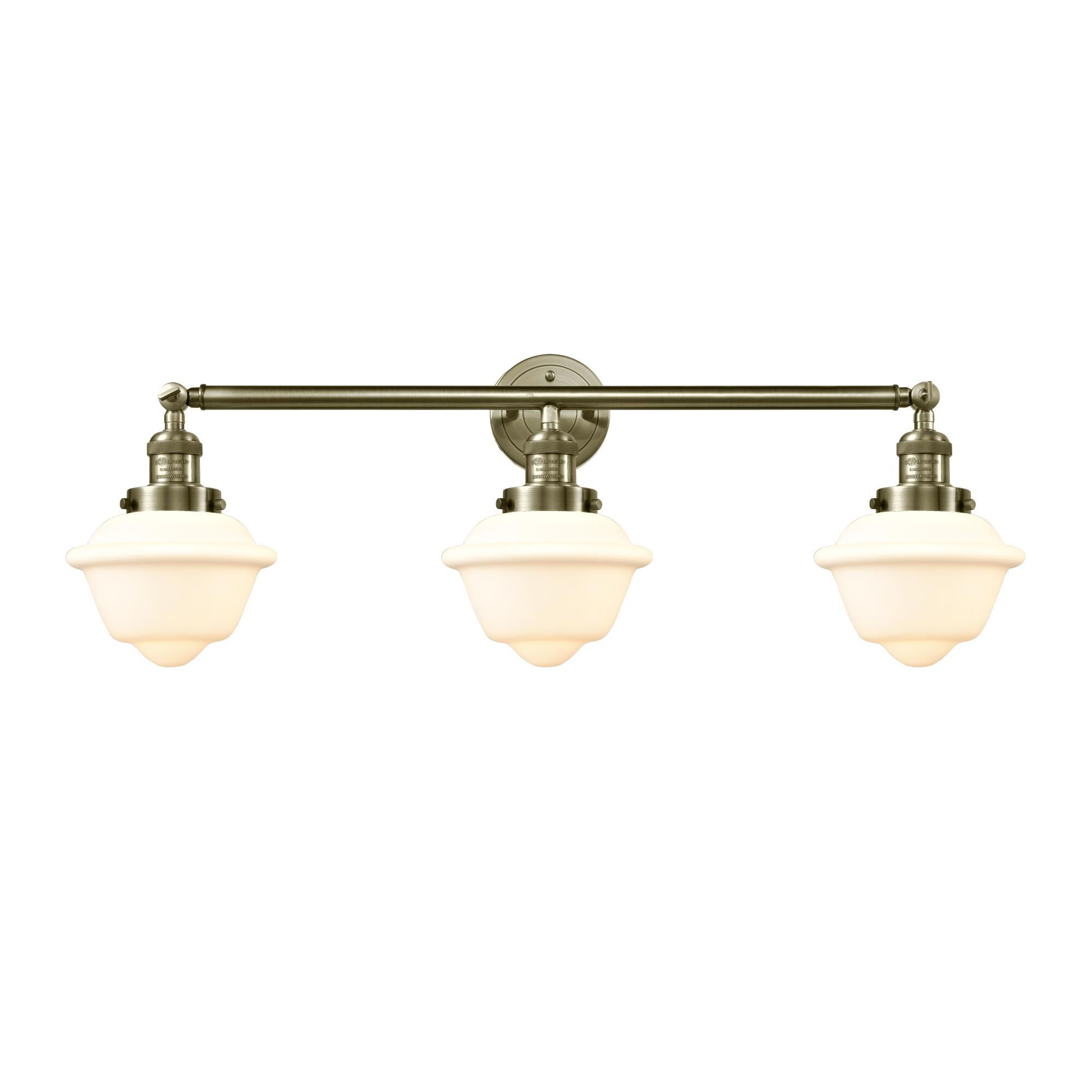 Shown in Antique Brass finish and Matte White Cased Small Oxford glass