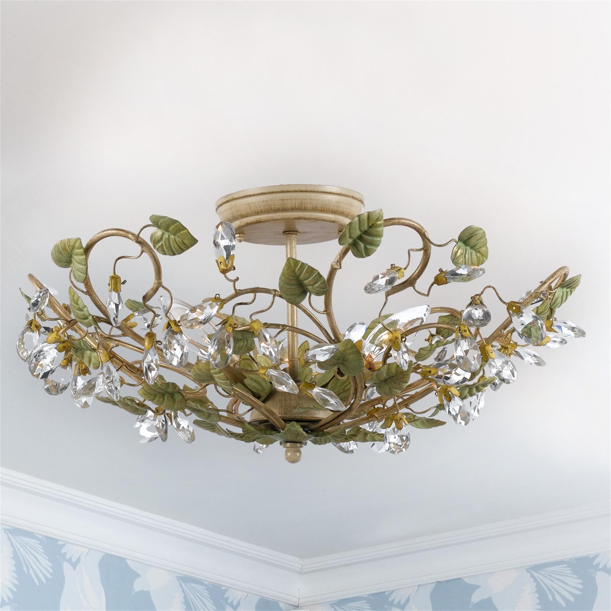 Shown in Champagne Green Tea finish and Clear Hand Cut crystal