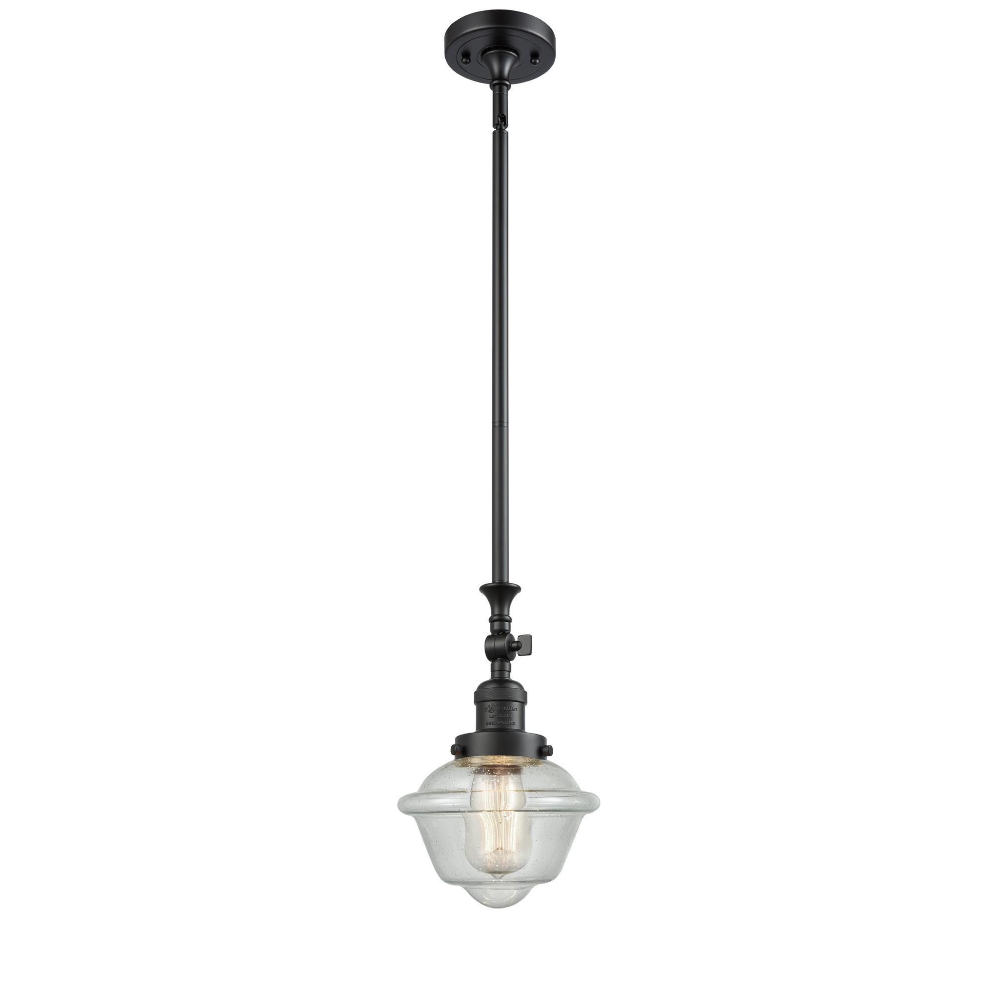 Shown in Matte Black finish and Seedy glass