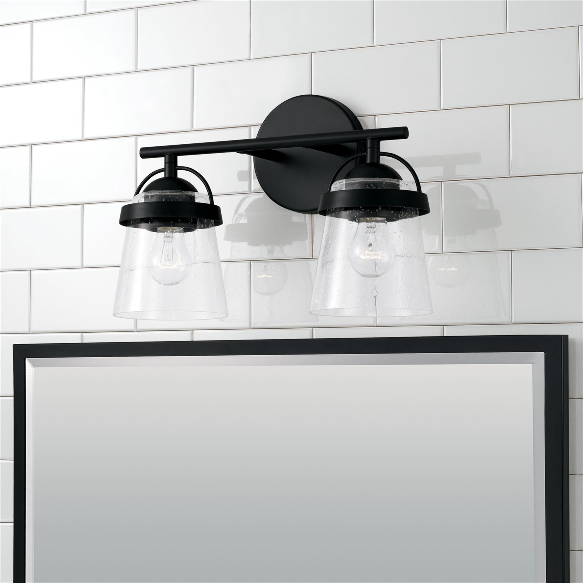 Shown in Matte Black finish and Clear Seeded glass