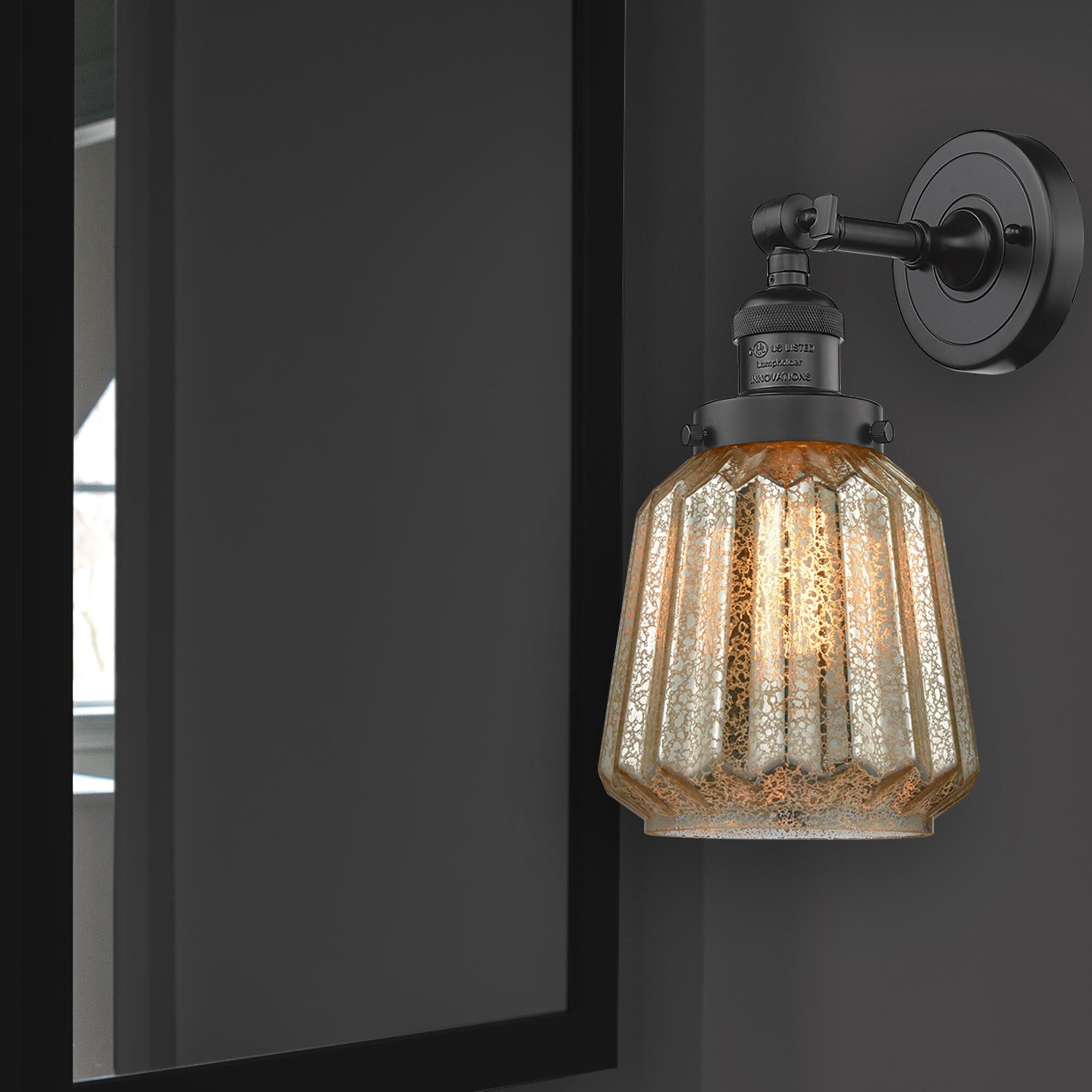 Shown in Oil Rubbed Bronze finish and Mercury Fluted glass