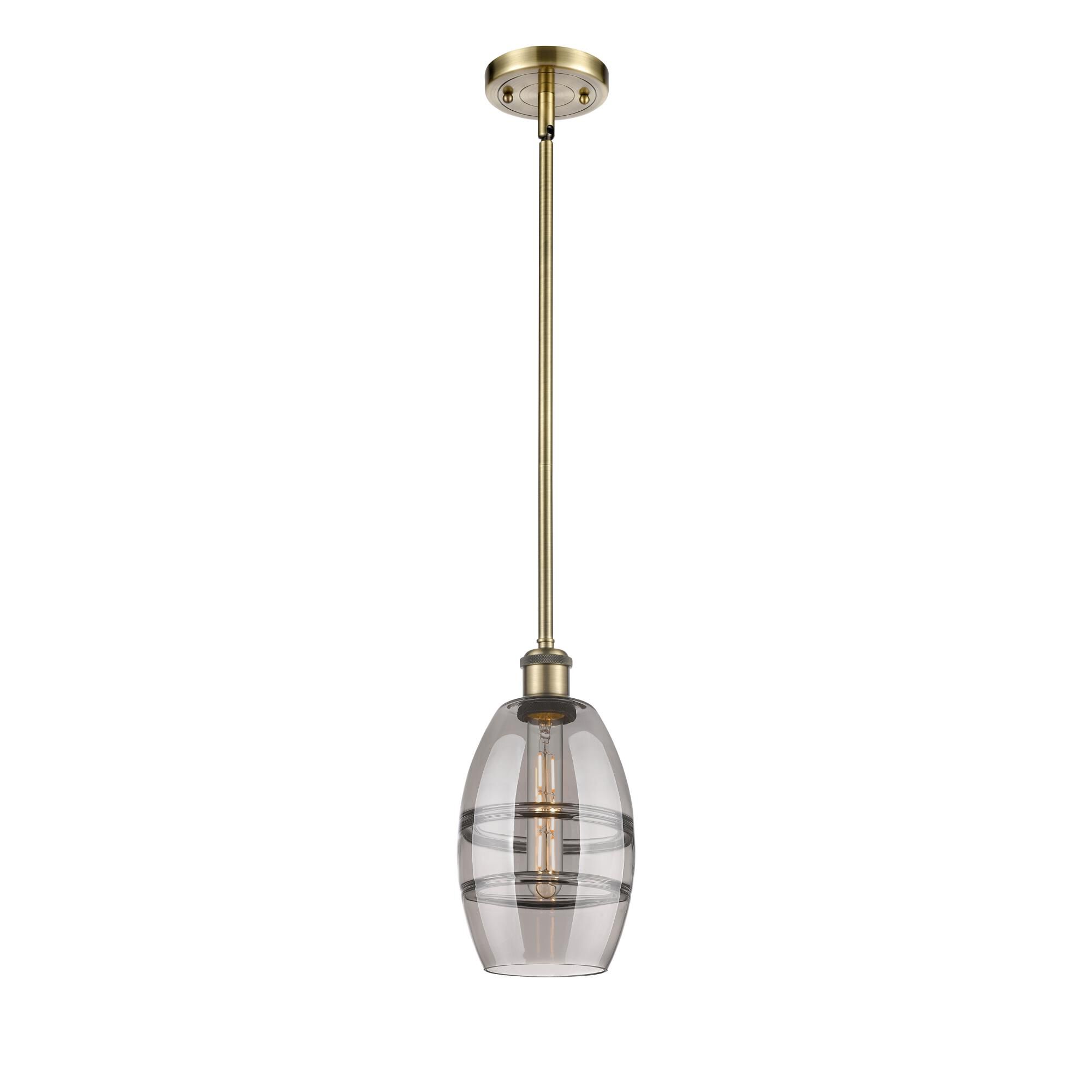 Shown in Antique Brass finish and Light Smoke glass