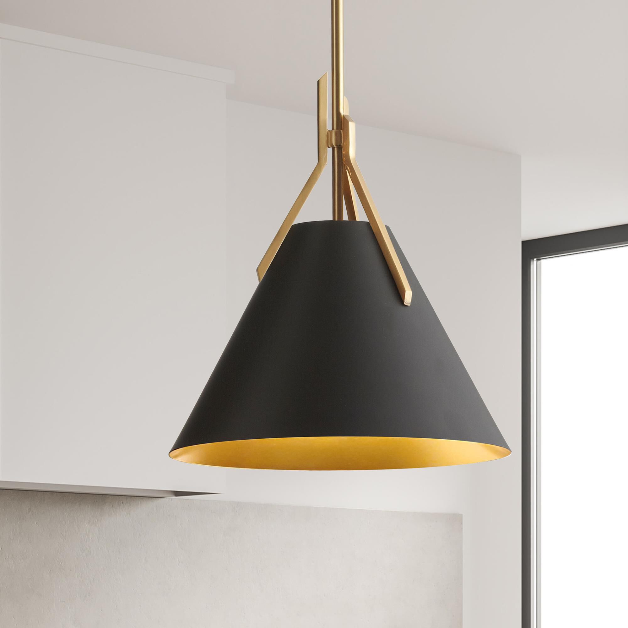 Shown in Aged Brass and Black finish and Black Metal Cone shade