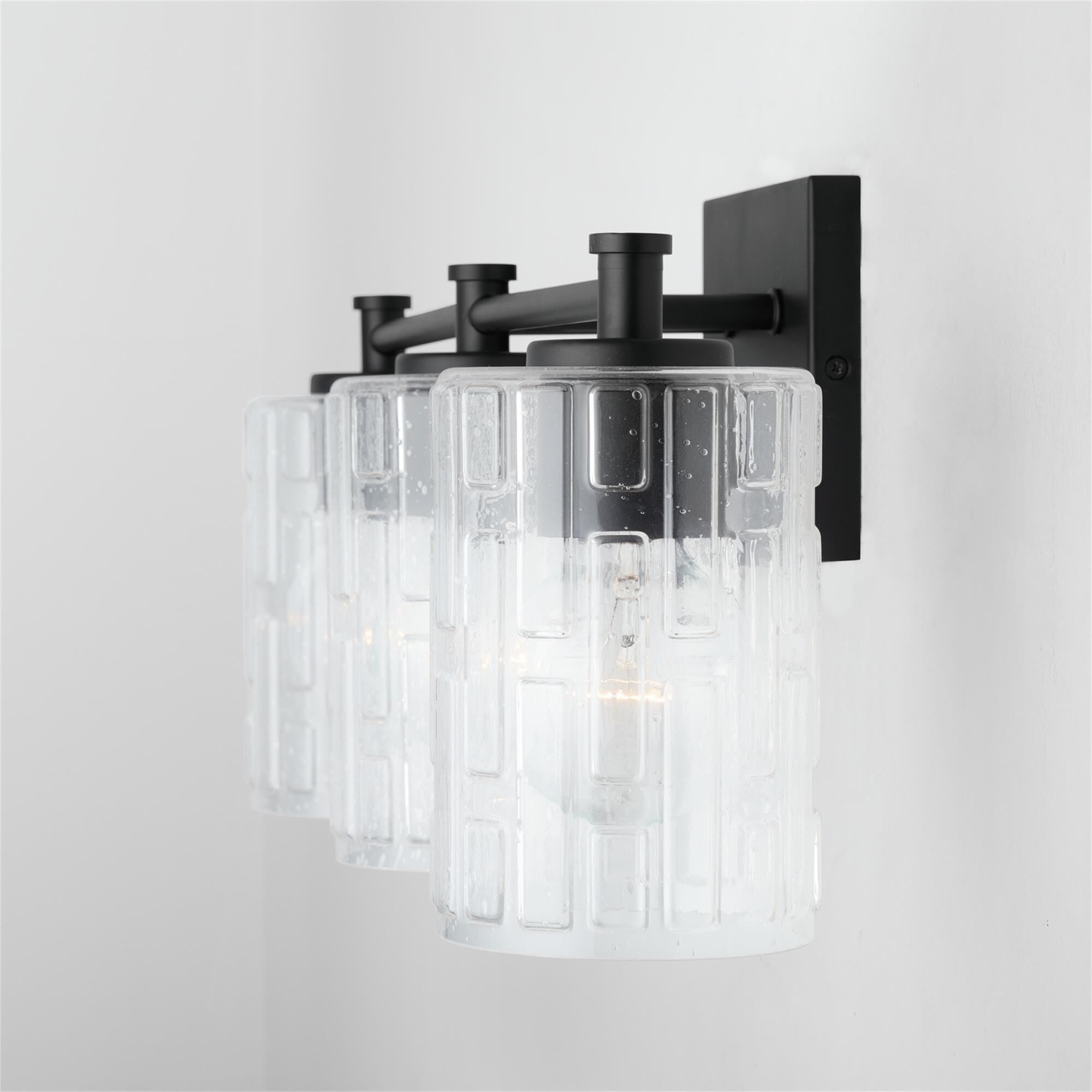 Shown in Matte Black finish and Clear Embossed glass