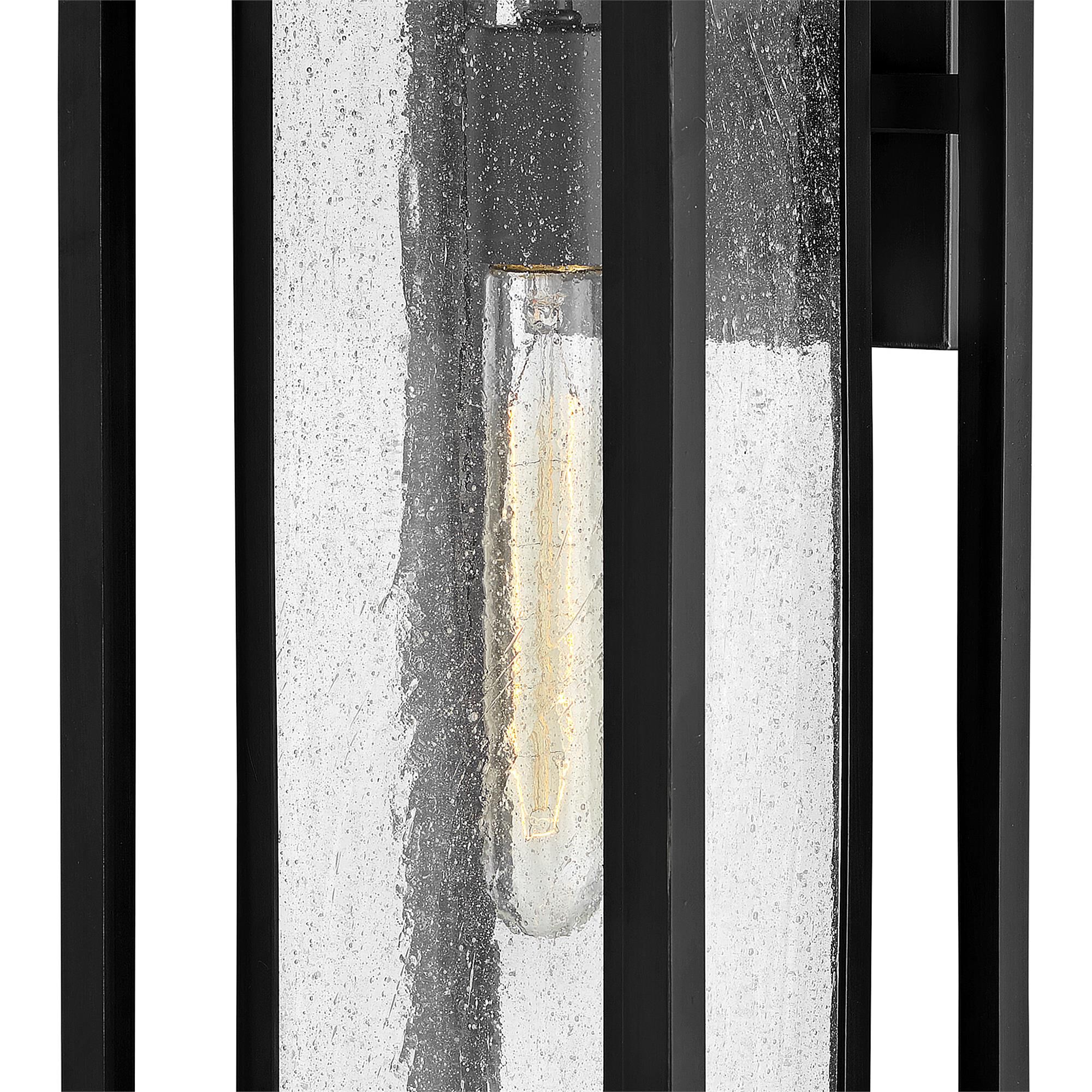 Shown in Black finish and Clear Seedy glass